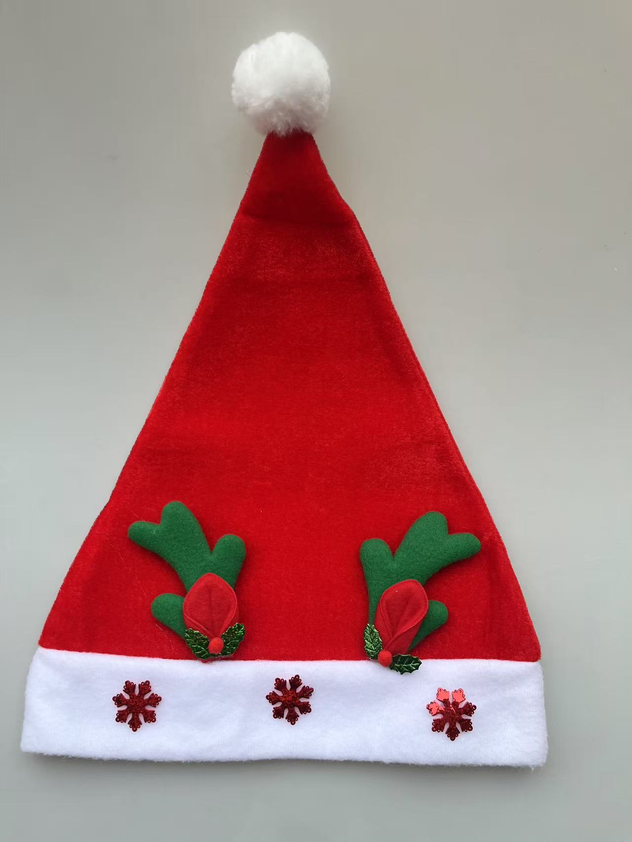 Wholesale of red adult plush Christmas hats as Christmas decorations details Picture