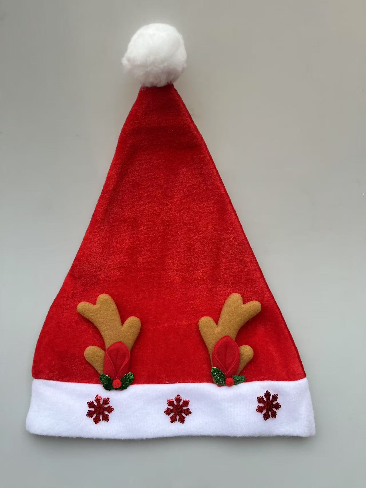 Wholesale of red adult plush Christmas hats as Christmas decorations Specification image