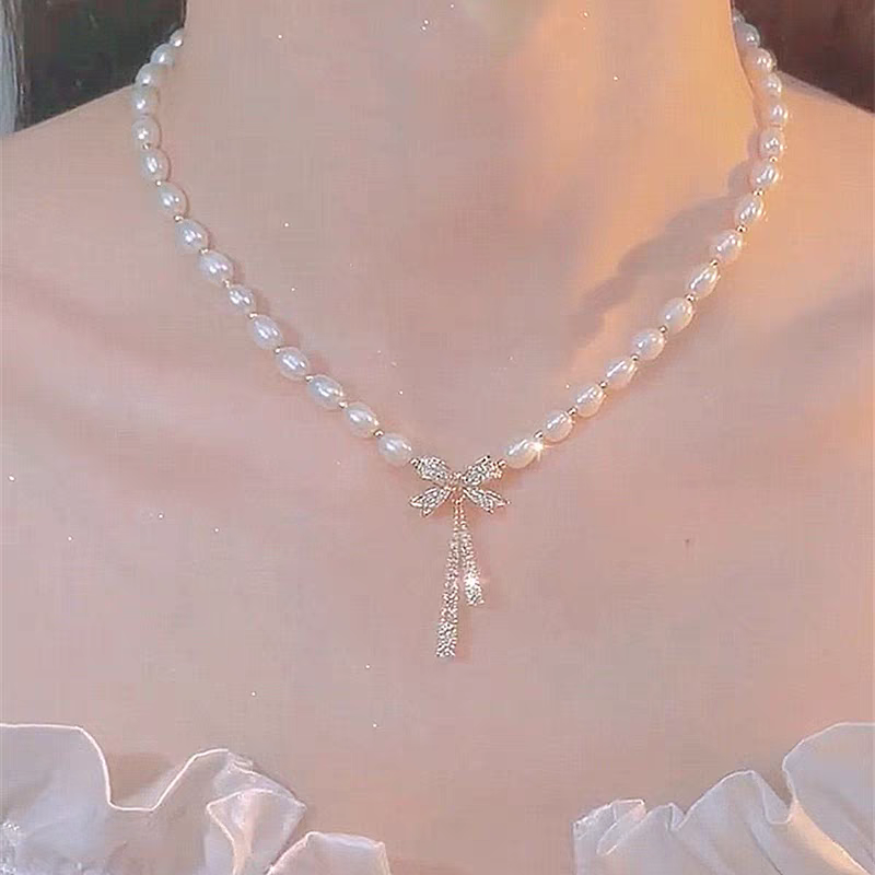 蝴蝶结仿珍珠项链女新款潮轻奢设计感高级网红气质锁骨链颈链