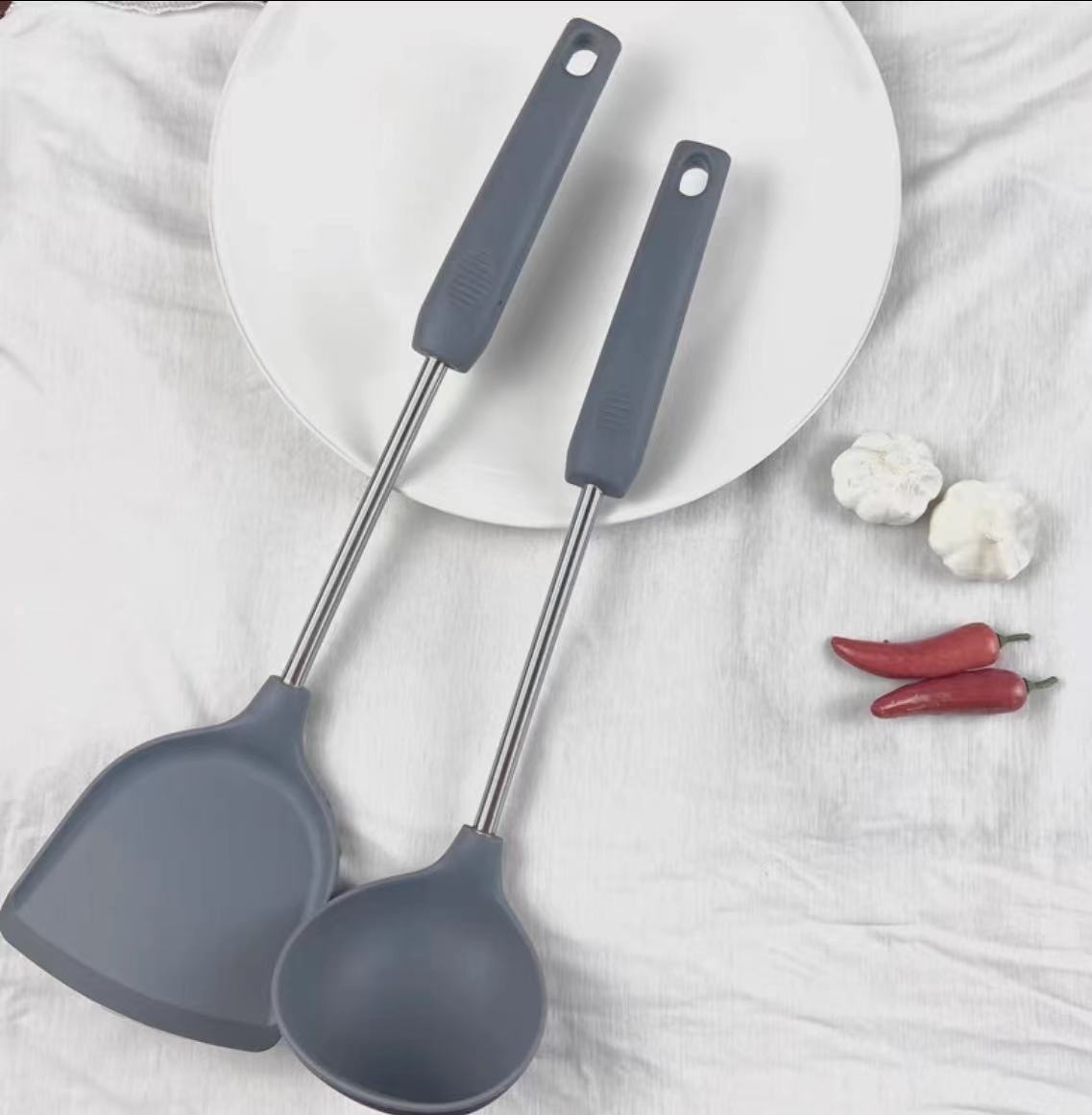 Manufacturer's in-stock 1088 steel-handled silicone kitchenware, kitchen silicone spatula, food-grade cooking spoon spatula, stir-frying spatula, non-stick pan