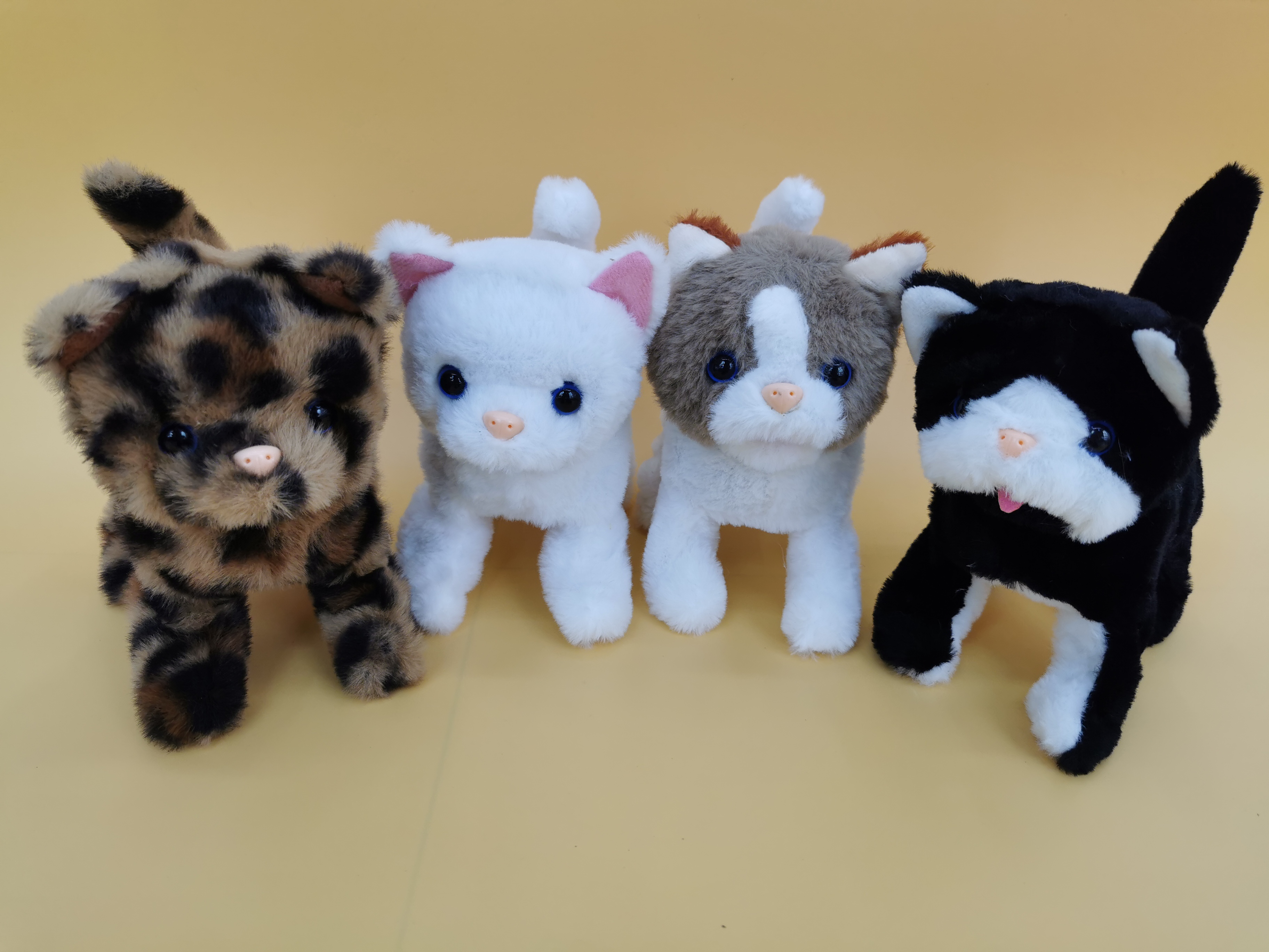 The 2025 new cute plush drawstring tongue-sticking electric kitten children's simulation toy can walk, move and bark