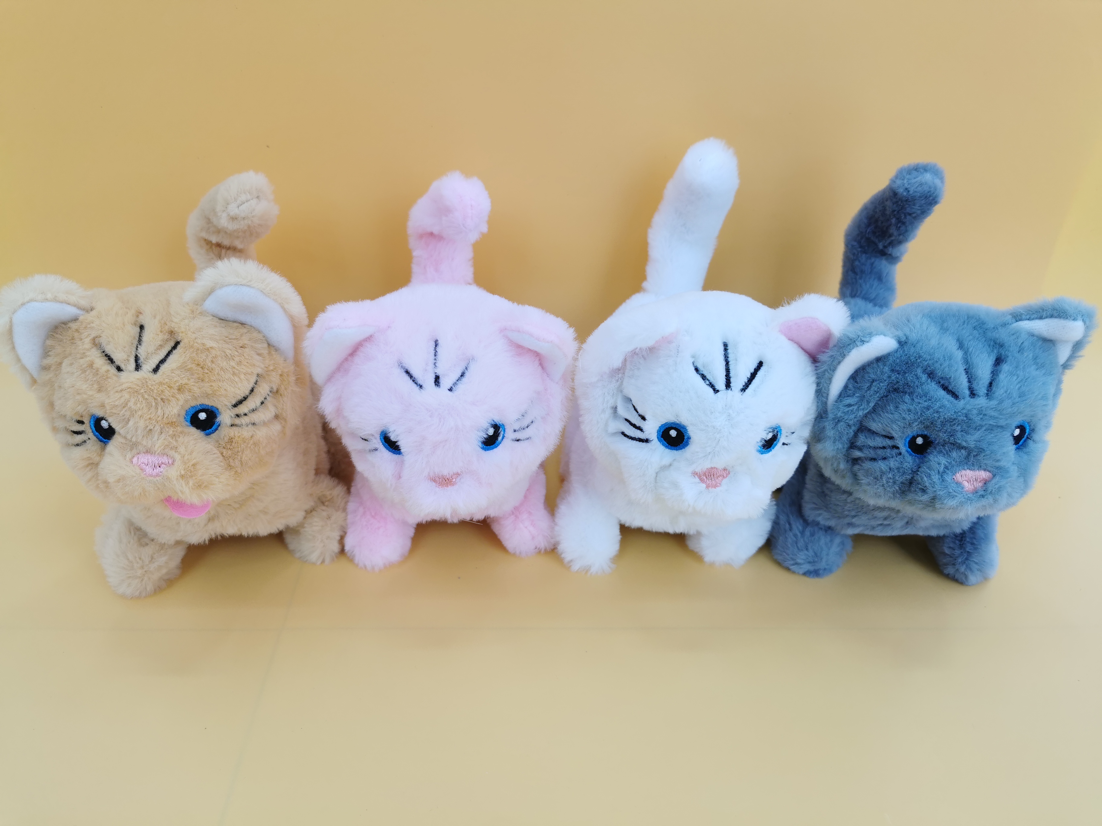 A 2025 new cute plush drawstring, tongue-sticking electric embroidered cat that can walk and bark, a children's gift