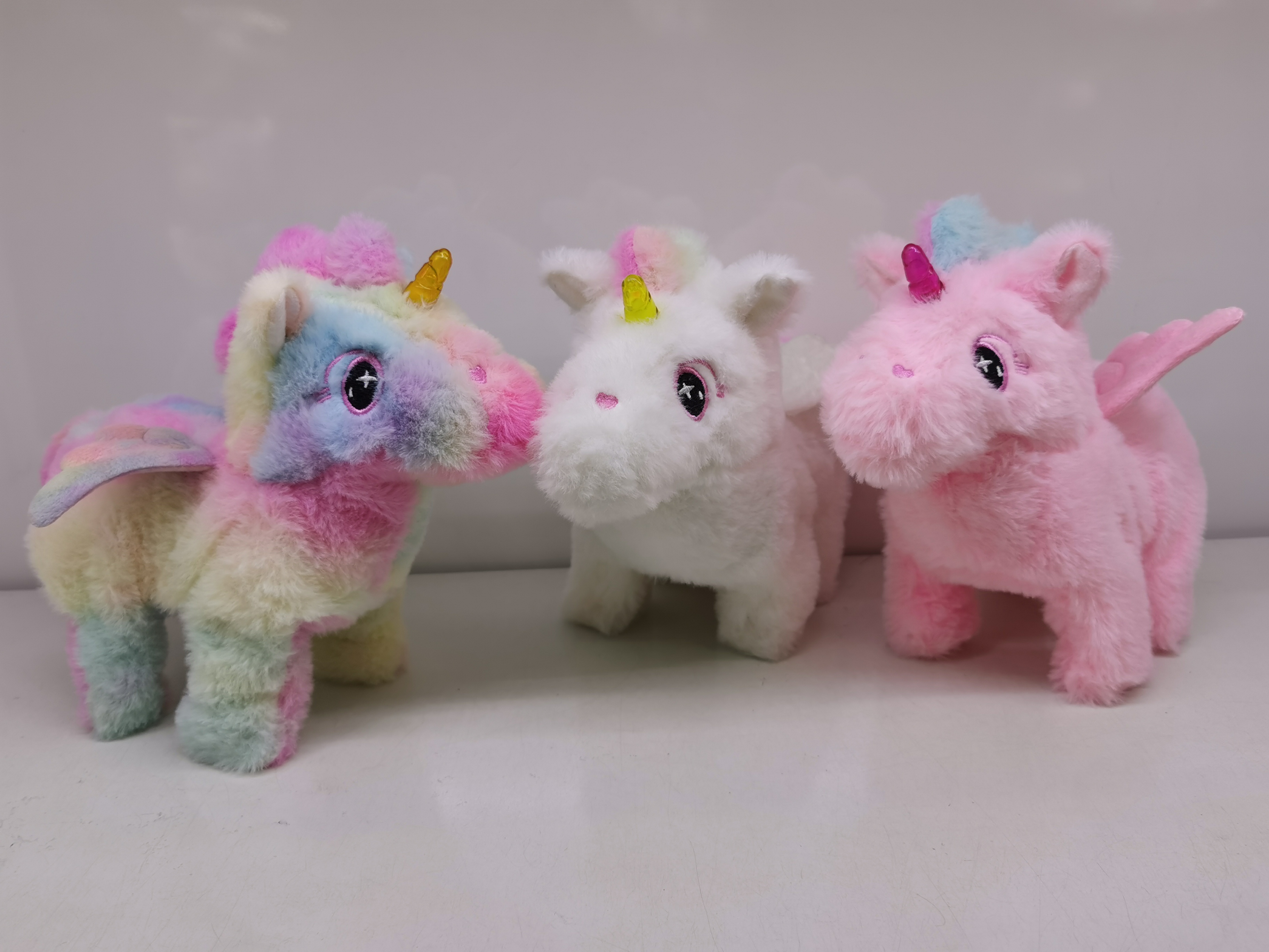 The 2025 new cute plush drawstring tongue extension electric lighting unicorn children's simulation toy can walk, move and cry