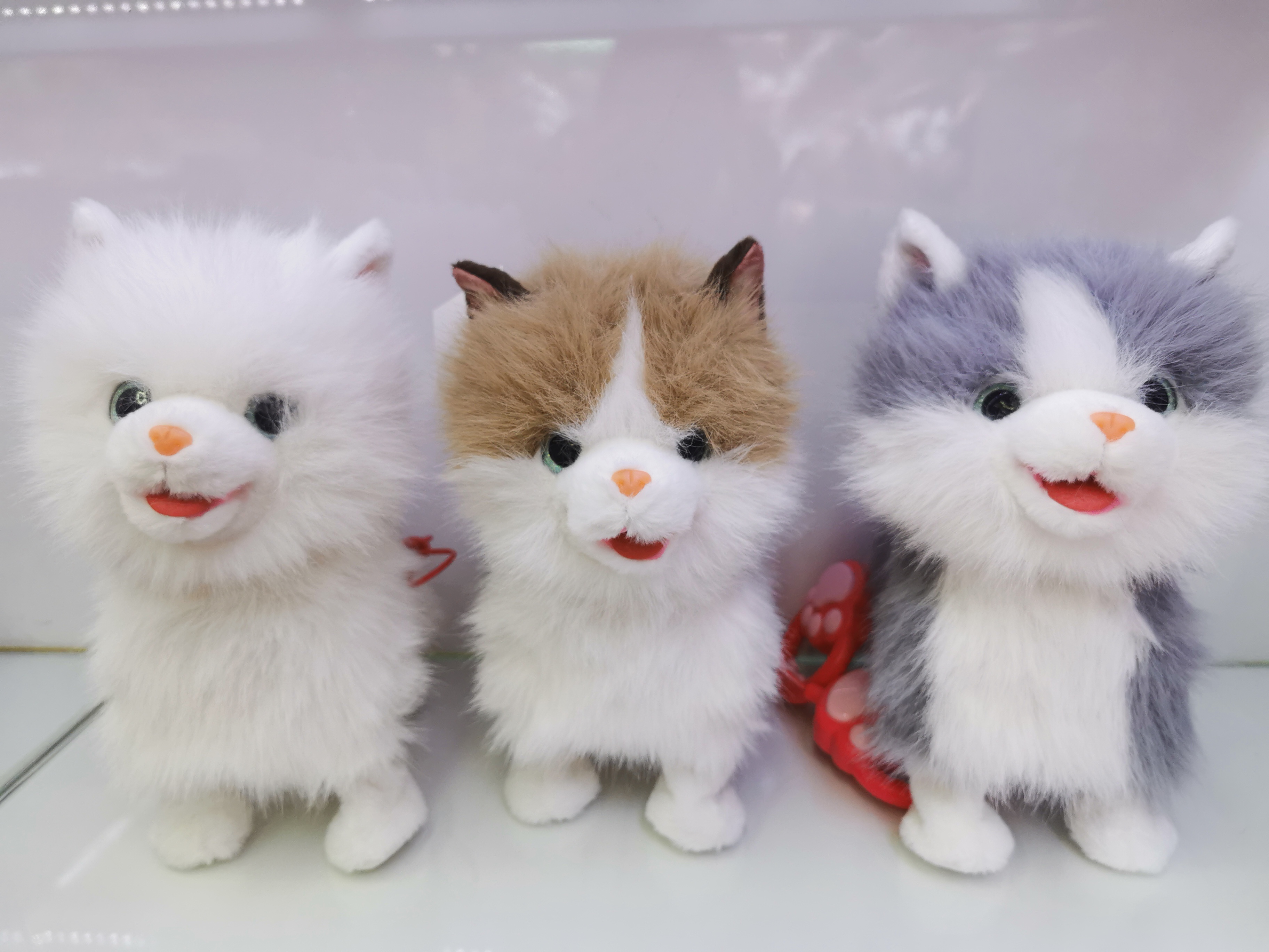 The 2025 new cute plush leash tongue-sticking electric long-haired cat children's simulation toy can walk, move and meow