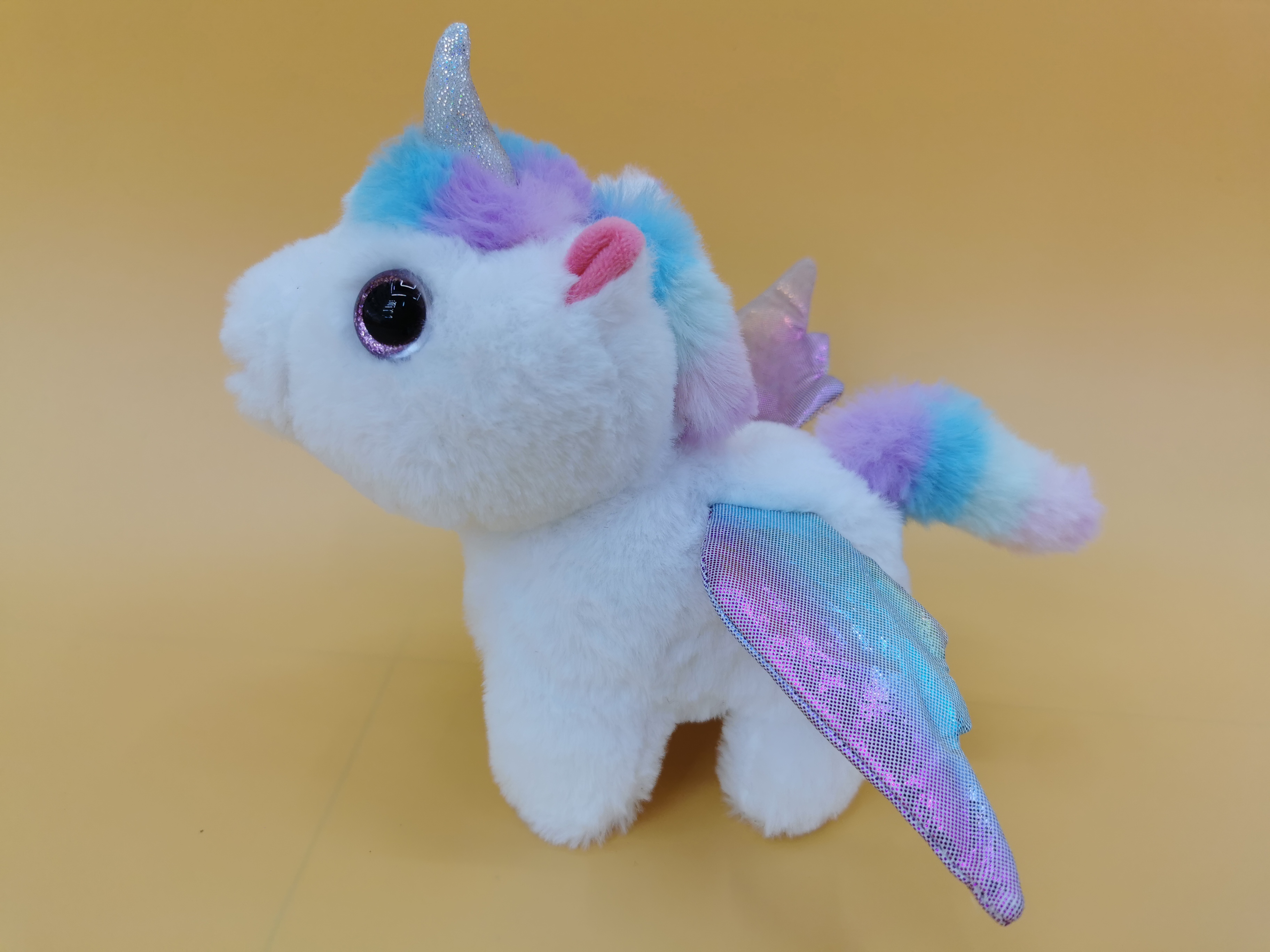 The 2025 new cute plush cartoon unicorn children's simulation toy can walk, move and make sounds