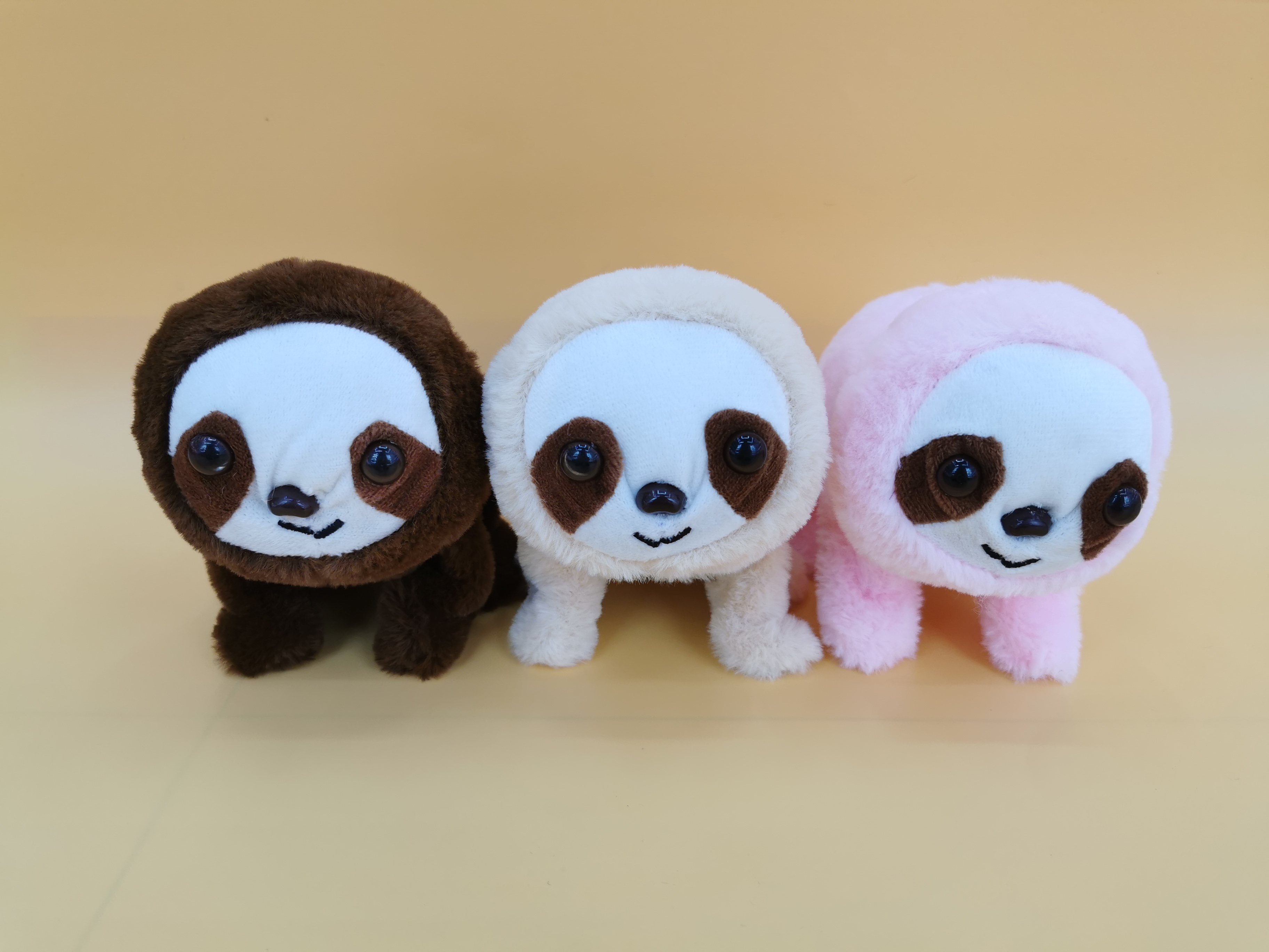 The 2025 new cute plush drawstring tongue-stretching electric sloth children's simulation toy can walk, move and bark
