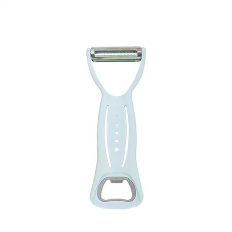 A multi-functional kitchen peeler, shred and bottle opening wonder. A three-in-one peeler and shred wonder detail image 3
