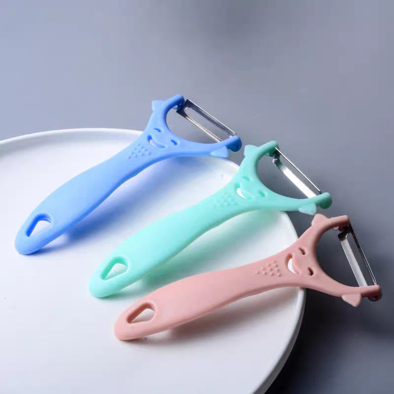 Stainless steel peeler for melon, kitchenware, fruit peeler, plastic handle, household gift, smiling face peeler details Picture