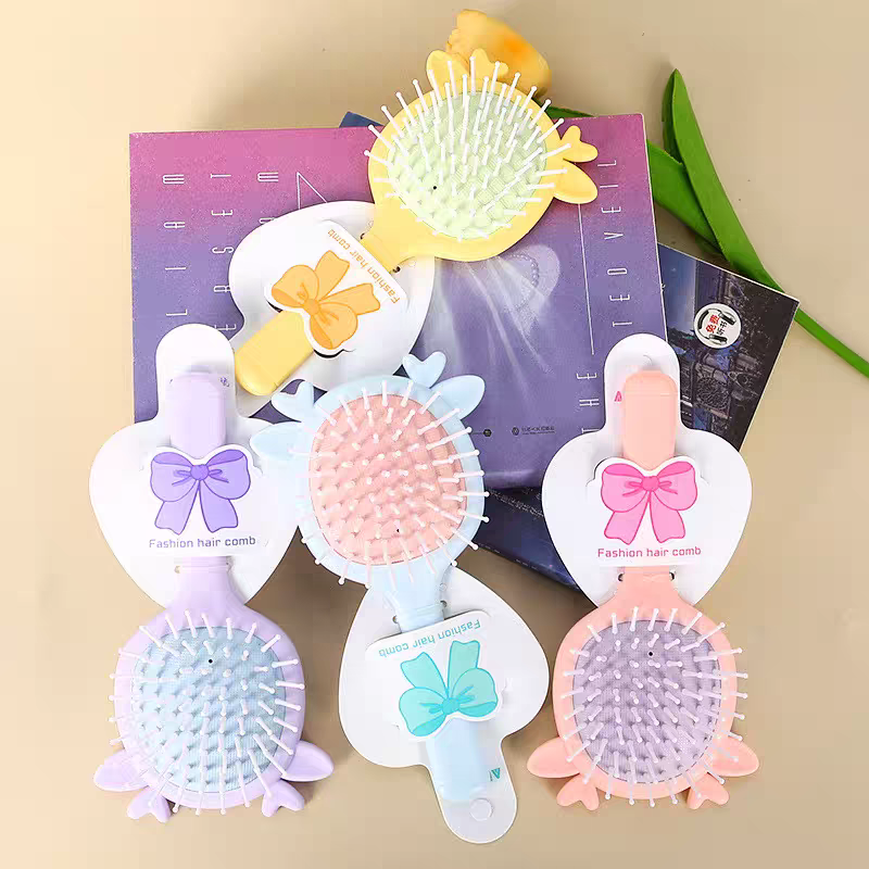 Candy-colored cartoon airbag comb, fashionable girl hair comb, portable and portable soothing airbag massage comb detail image 3
