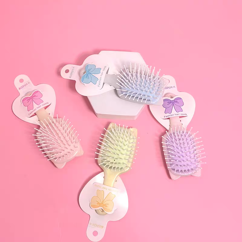 New air cushion comb, mini cartoon air bag comb, hair massage comb, portable candy-colored hanging card comb detail image 2