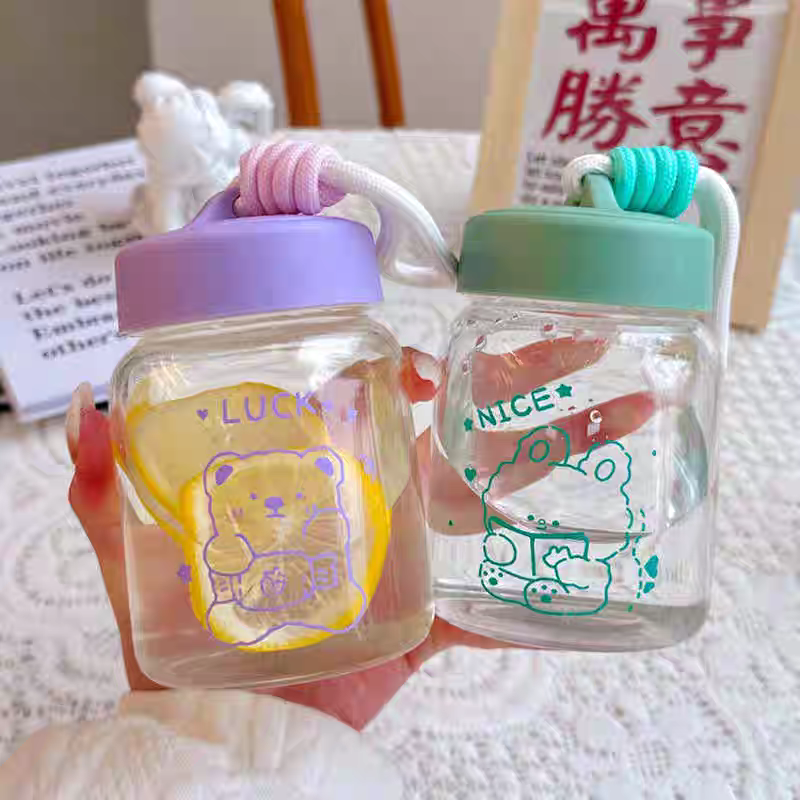 Korean-style high appearance level fresh and light glass cup, portable drawstring drinking cup, children, students, office summer milk cup Application Scenario