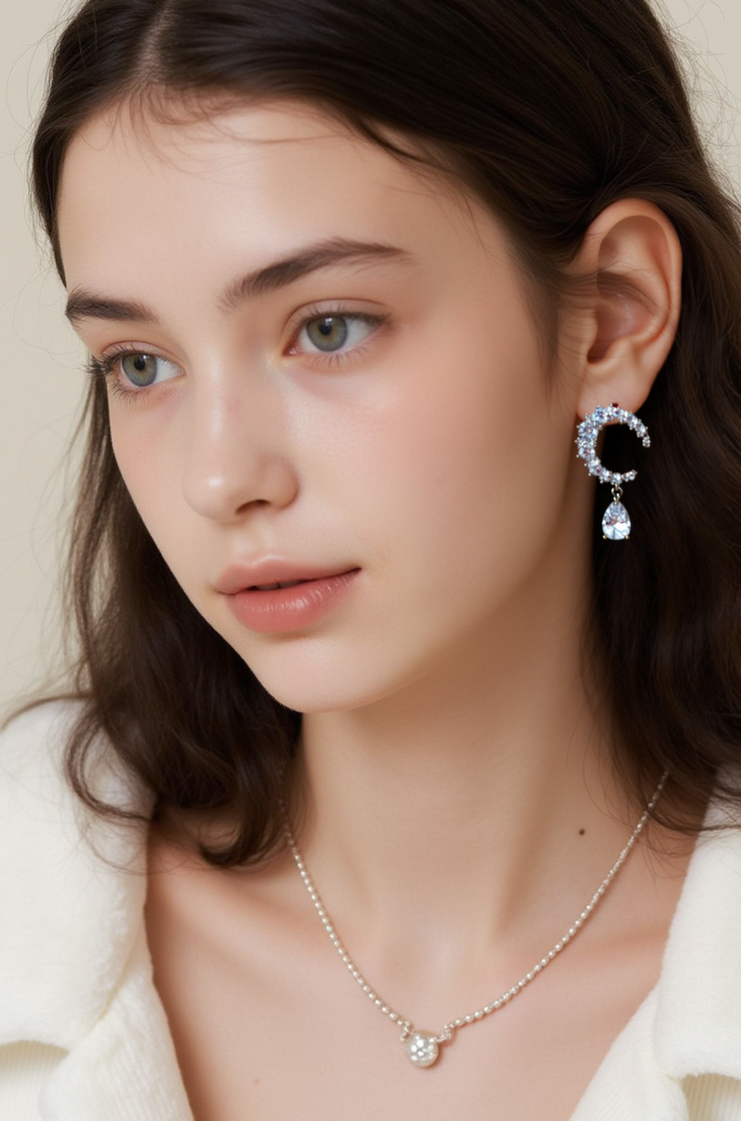 Xuhui brand exquisite and light luxury copper plated with real gold and set with zircon 925 silver needle star moon fashionable and elegant stud earrings full figure