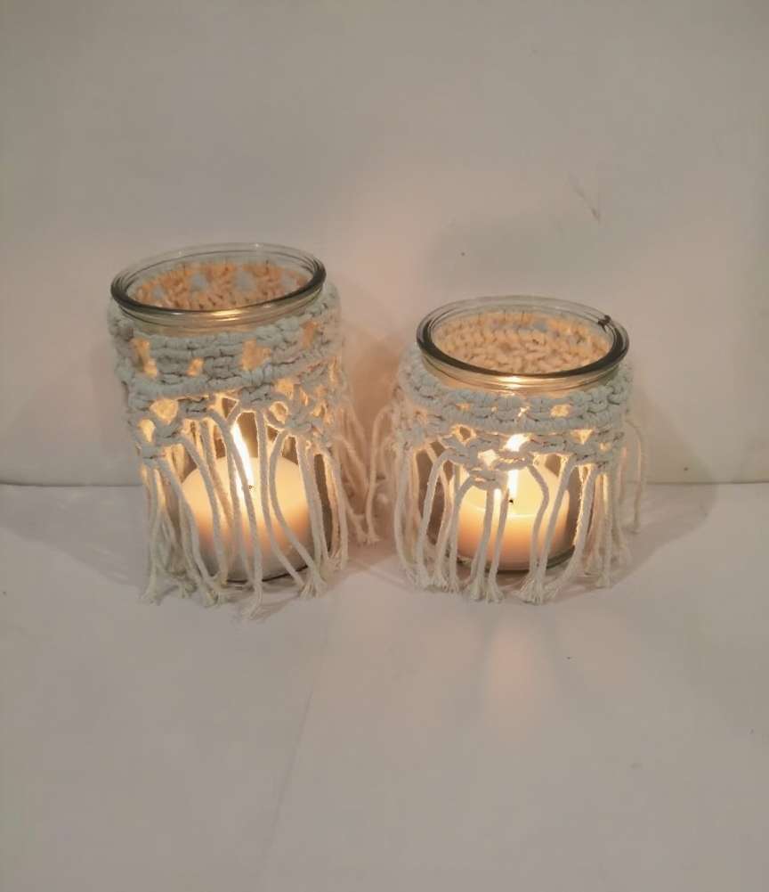 The interior decoration style of the hand-woven cotton rope glass candlestick is unique and has a retro feel