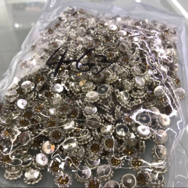 纽扣浅橙色水钻镶嵌服装辅料