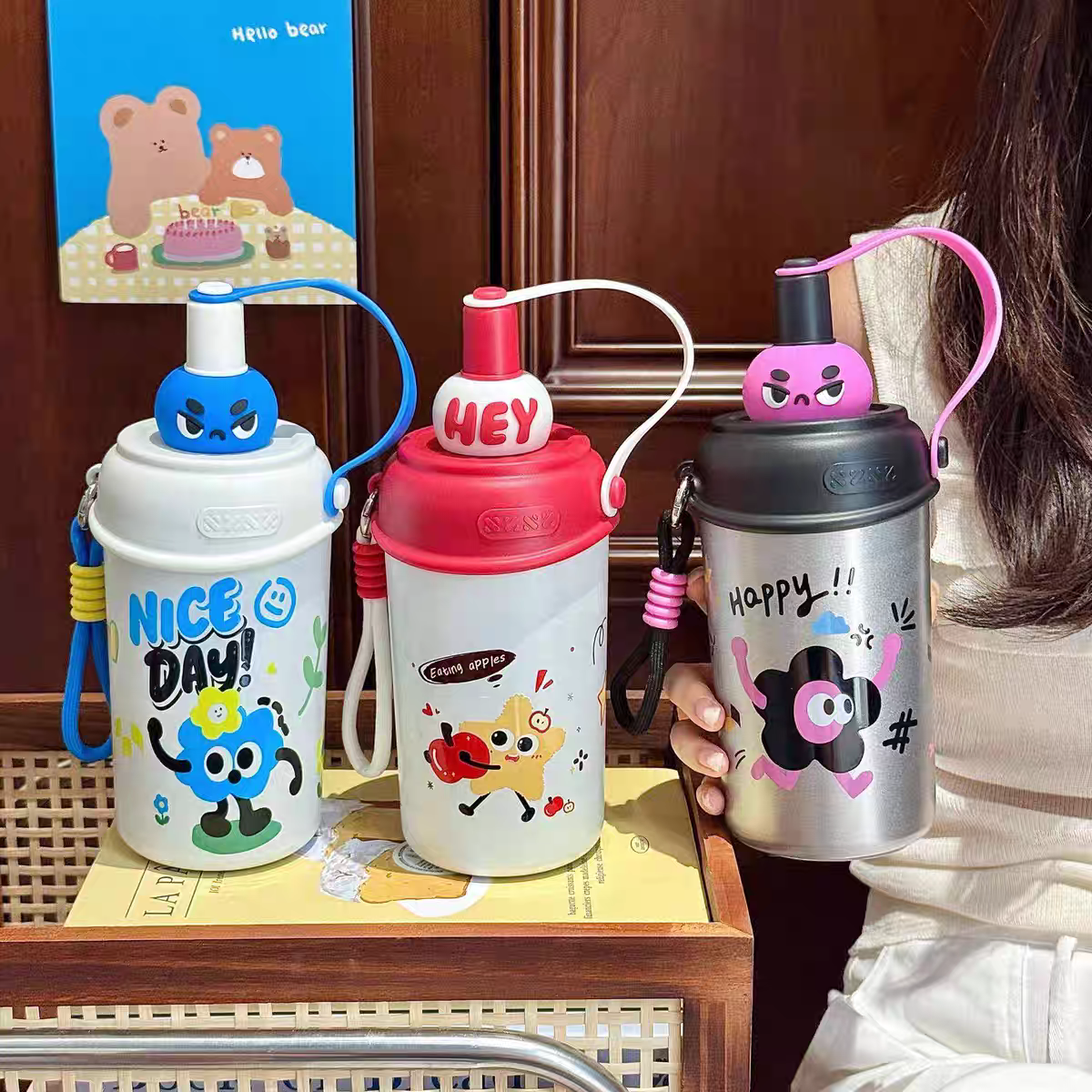 EYUN可爱公仔吸管杯便携学生水杯手提带茶漏高颜值卡通保温杯600ml产品图