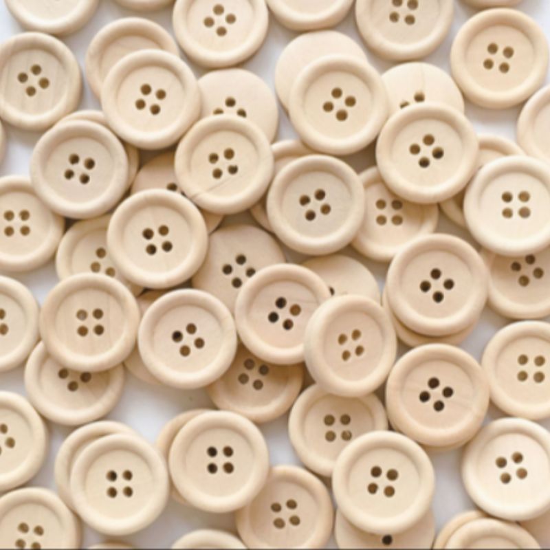 A beige resin suit with four round buttons