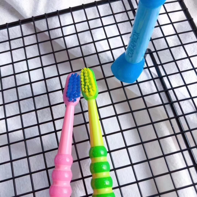 Free shipping wholesale Swiss Curaproxx 1954 brand oral soft bristle toothbrush 5460 (for adults) Application Scenario
