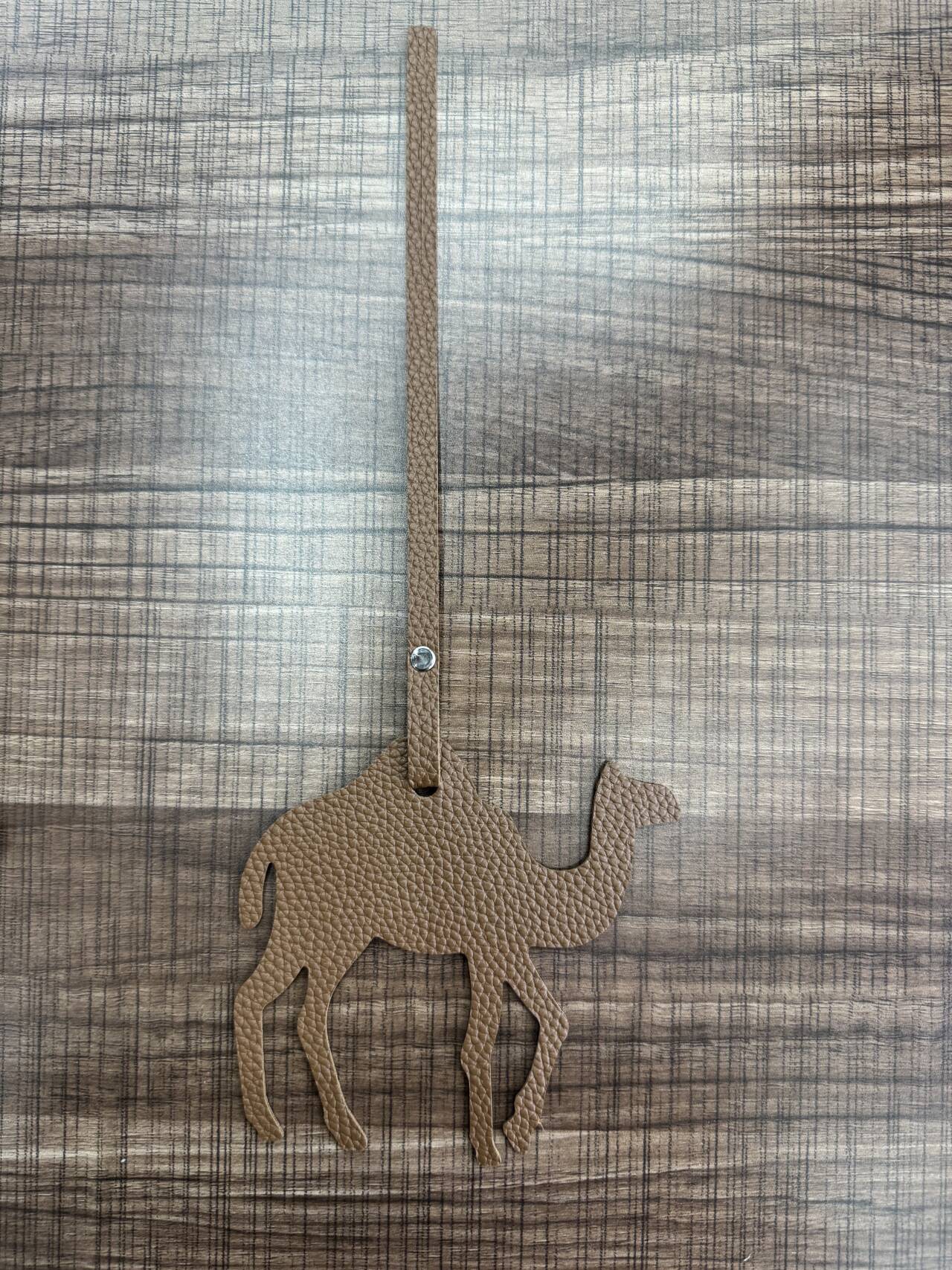 New camel pattern leather pendants, clothing, bags and accessories from the Middle East details Picture