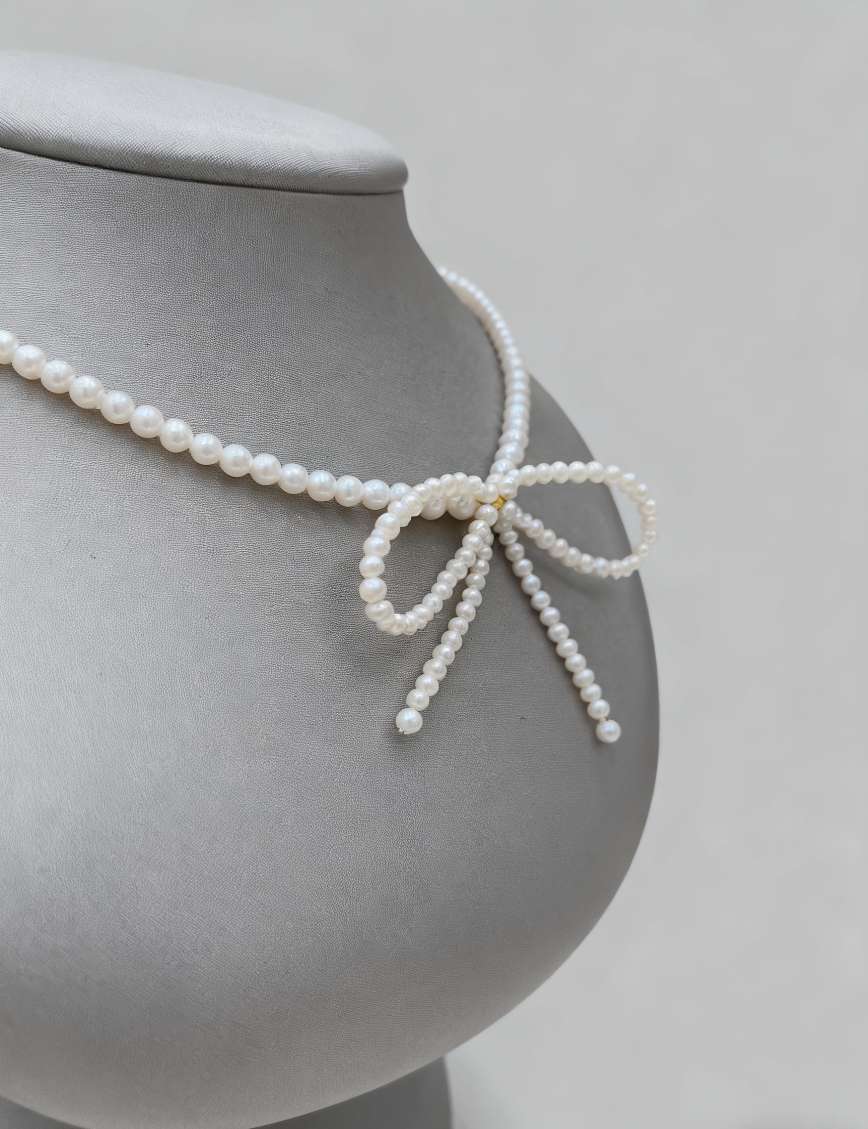Natural pearl bow necklace: Fashionable, simple, youthful and exquisite pearl necklace Application Scenario