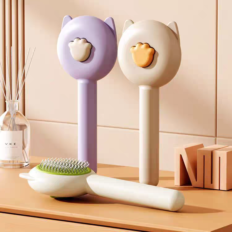 新款宠物梳子猫咪去浮毛梳子一键除毛清洁梳狗按摩除毛刷宠物用品