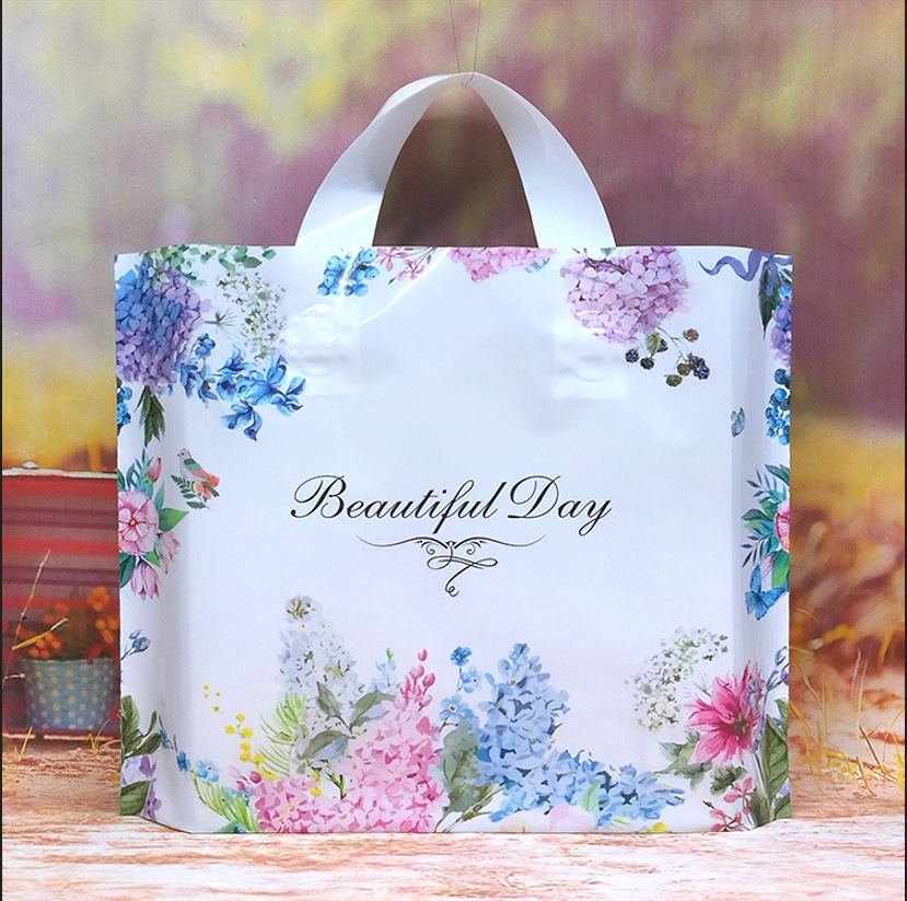 手柄服装袋手提袋 加厚塑料包装袋衣服同装店袋子大号服装礼品袋子