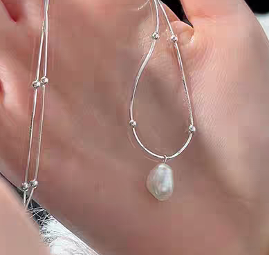 淡水珍珠项链女轻奢小众高级夹珠毛衣链2025新款生日礼物送女友