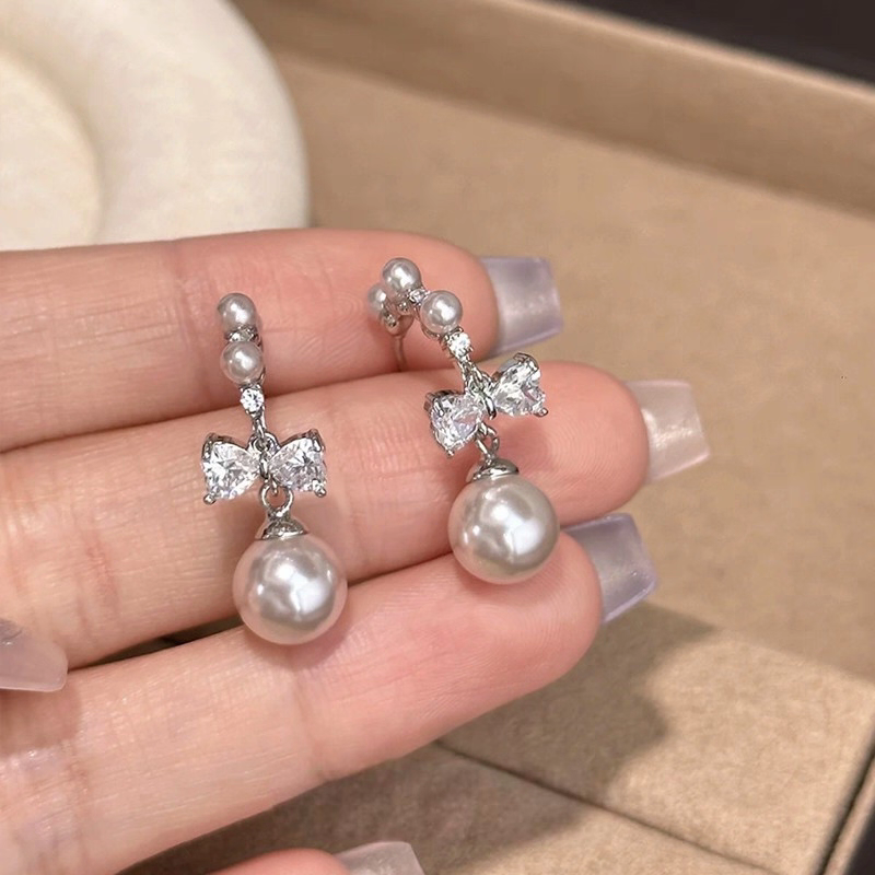 蝴蝶结珍珠流苏耳环女2025新款爆款高级感耳钉小众设计感耳饰耳坠细节图