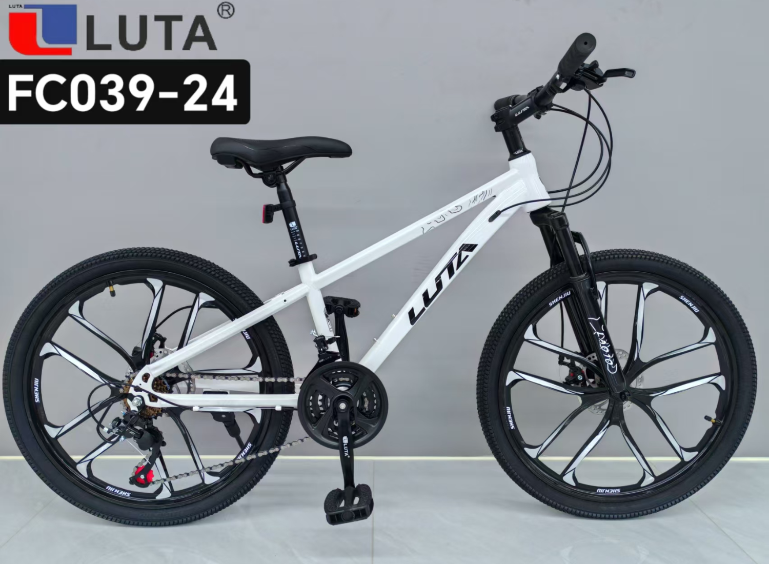 LUTA FC039-24 mountain bike, with a white body and black details, is fashionable and dynamic, suitable for urban riding and light off-roading.