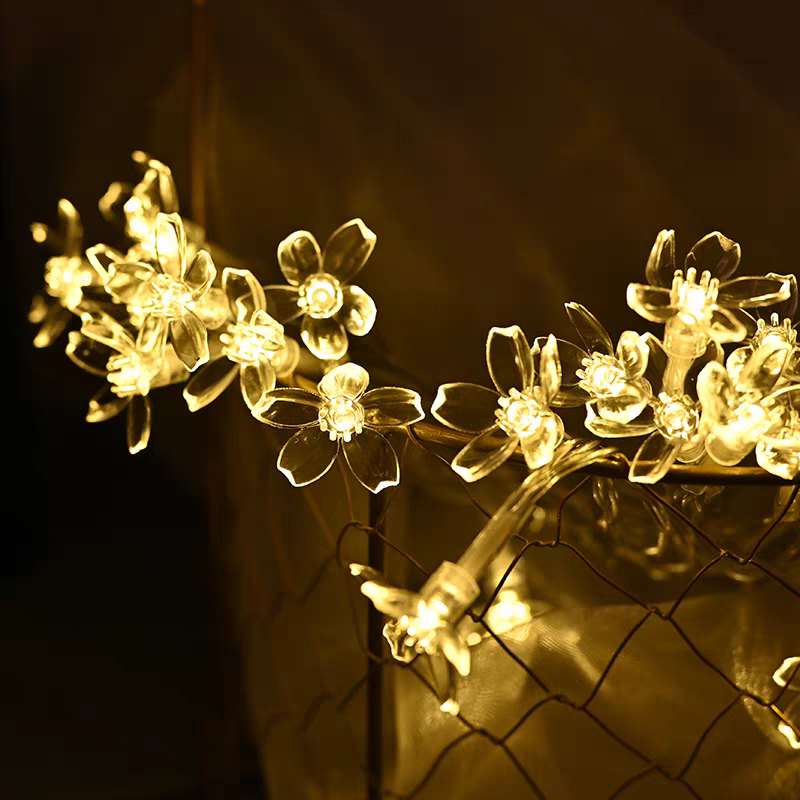 Cherry blossom solar light string, outdoor waterproof courtyard decoration atmosphere light, garden balcony arrangement flash light, led color light, 5 meters, 20 lights Application Scenario