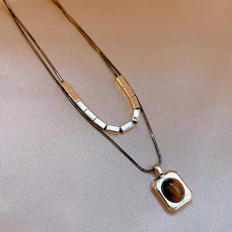 诗洛琪饰品叠戴美拉德虎眼石吊坠项链女款高级感轻奢小众毛衣链新款配饰细节图