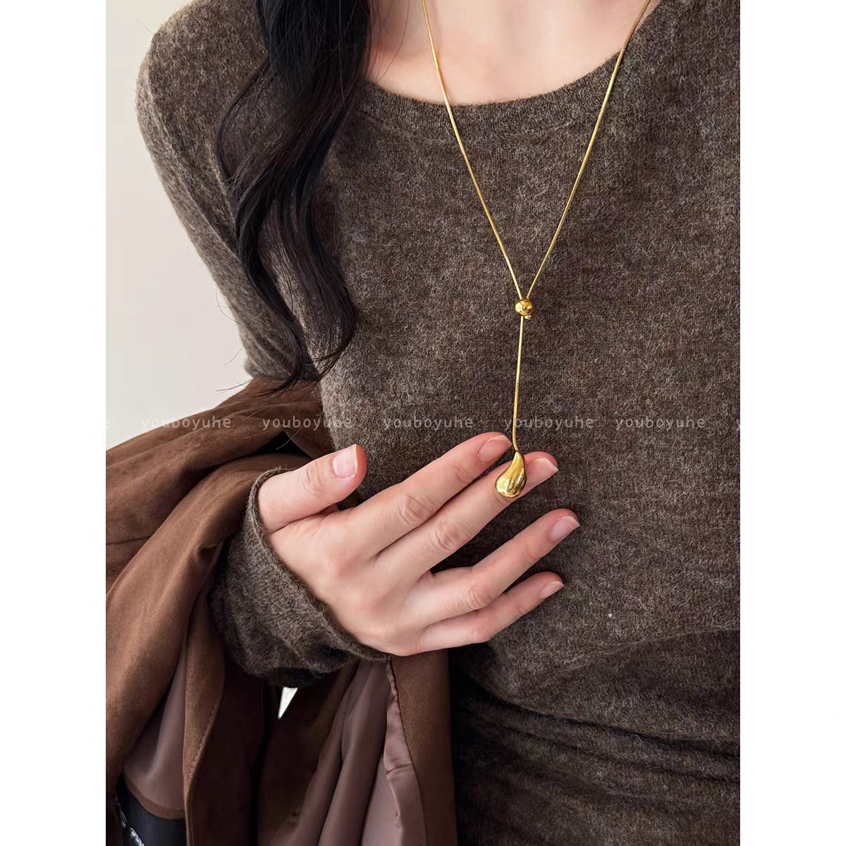 诗洛琪饰品韩系高品质金色水滴抽拉长款项链女新款时尚高级毛衣链配饰细节图