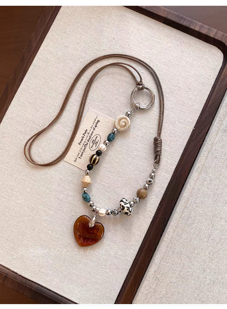 诗洛琪饰品爱心串珠吊坠项链女新款民族风秋冬长款编绳毛衣链高级感配饰详情图4