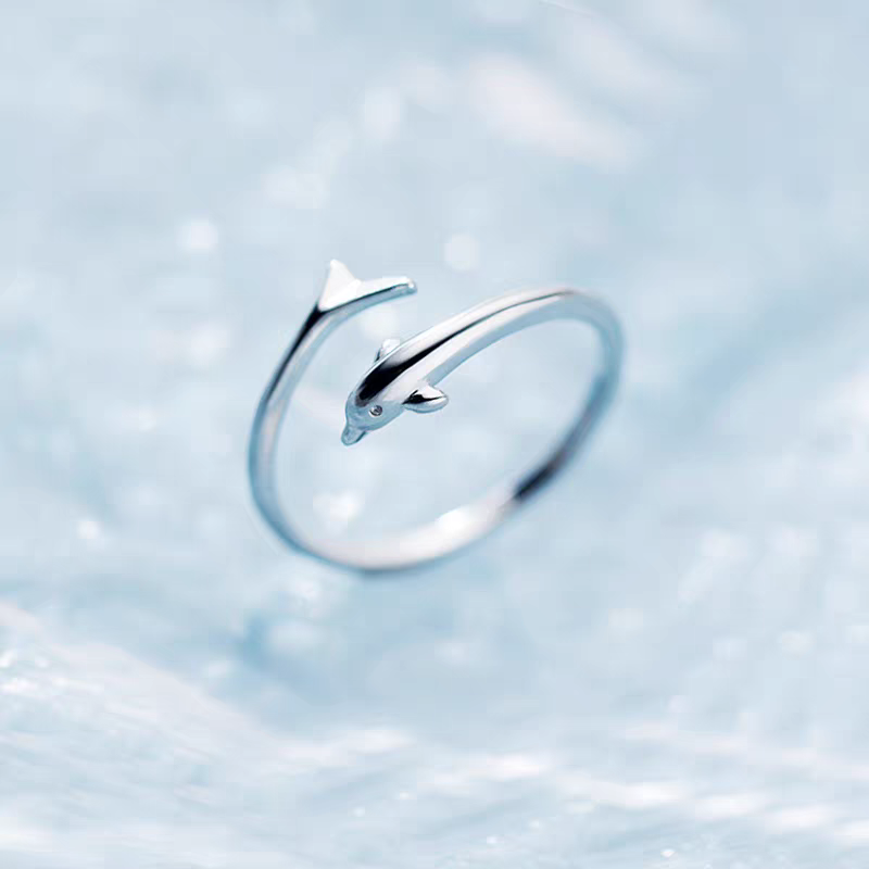 A pure silver dolphin ring