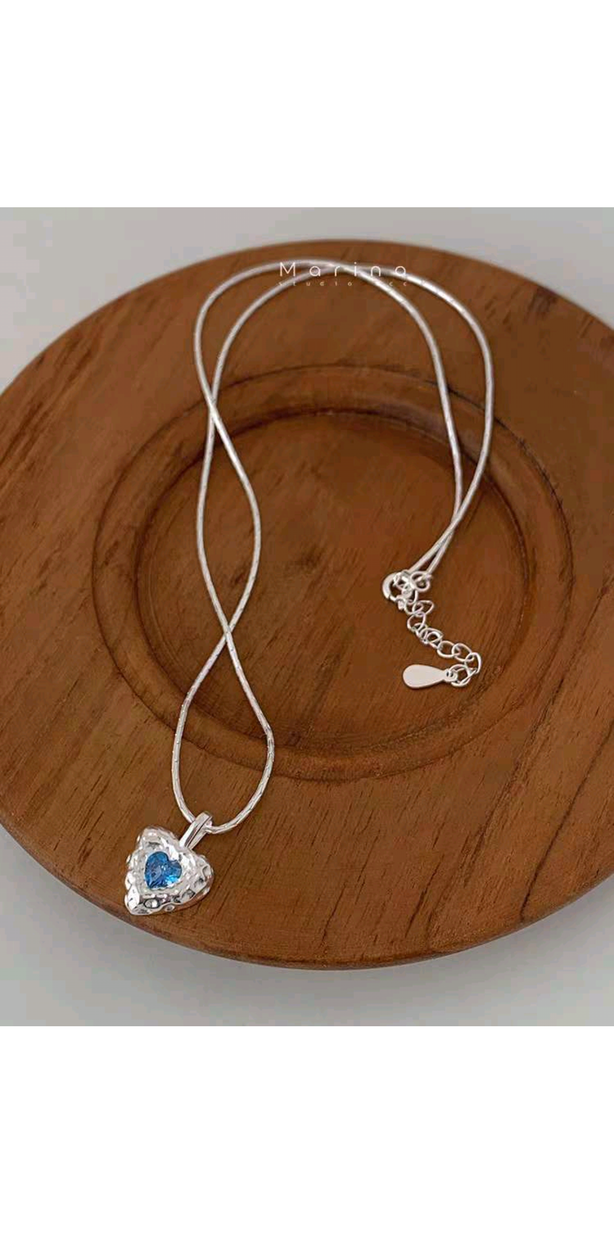 The S925 pure silver blue heart-shaped necklace exudes a high-end feminine charm. It features a sweet and cool, niche design. The collarbone chain is a unique and cold style accessory detail image 4