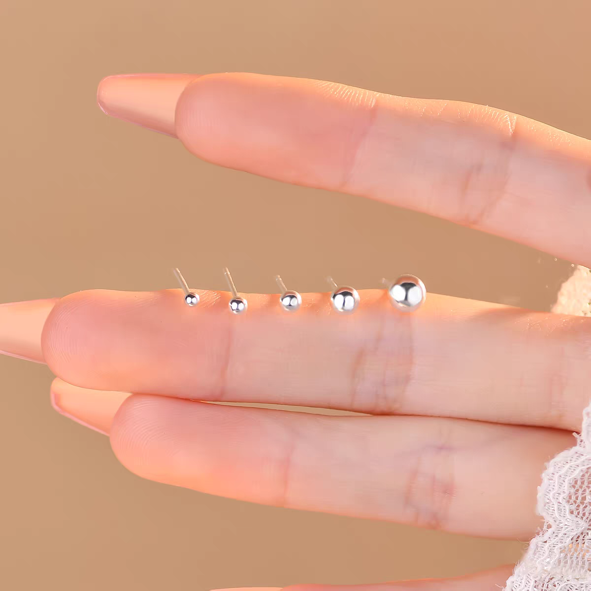 S990 pure silver bean stud earrings, a niche design with a high-end feel, no need to remove round bead stud earrings for ear piercing while sleeping detail image 3