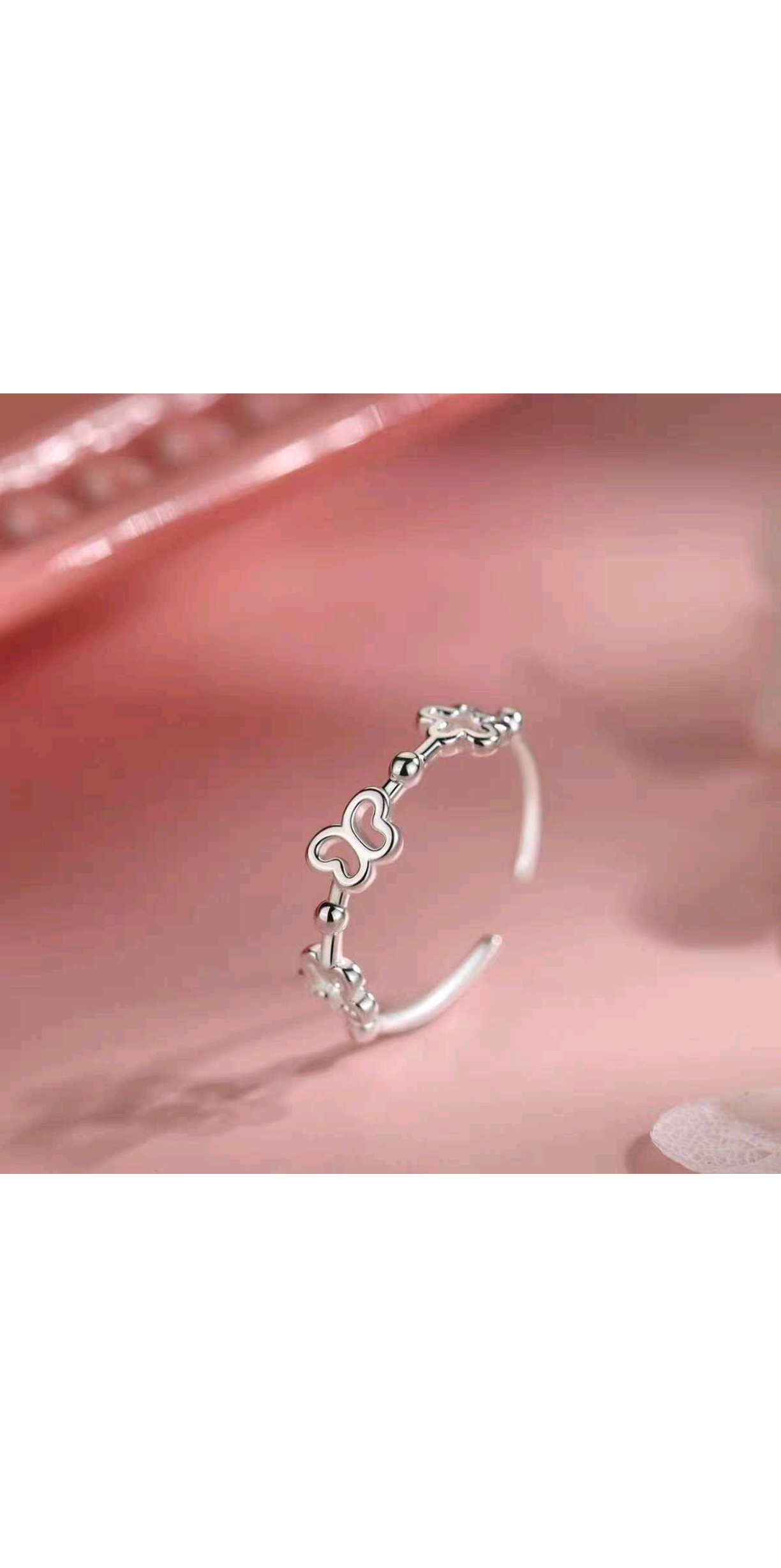 Silver hollowed-out butterfly ring