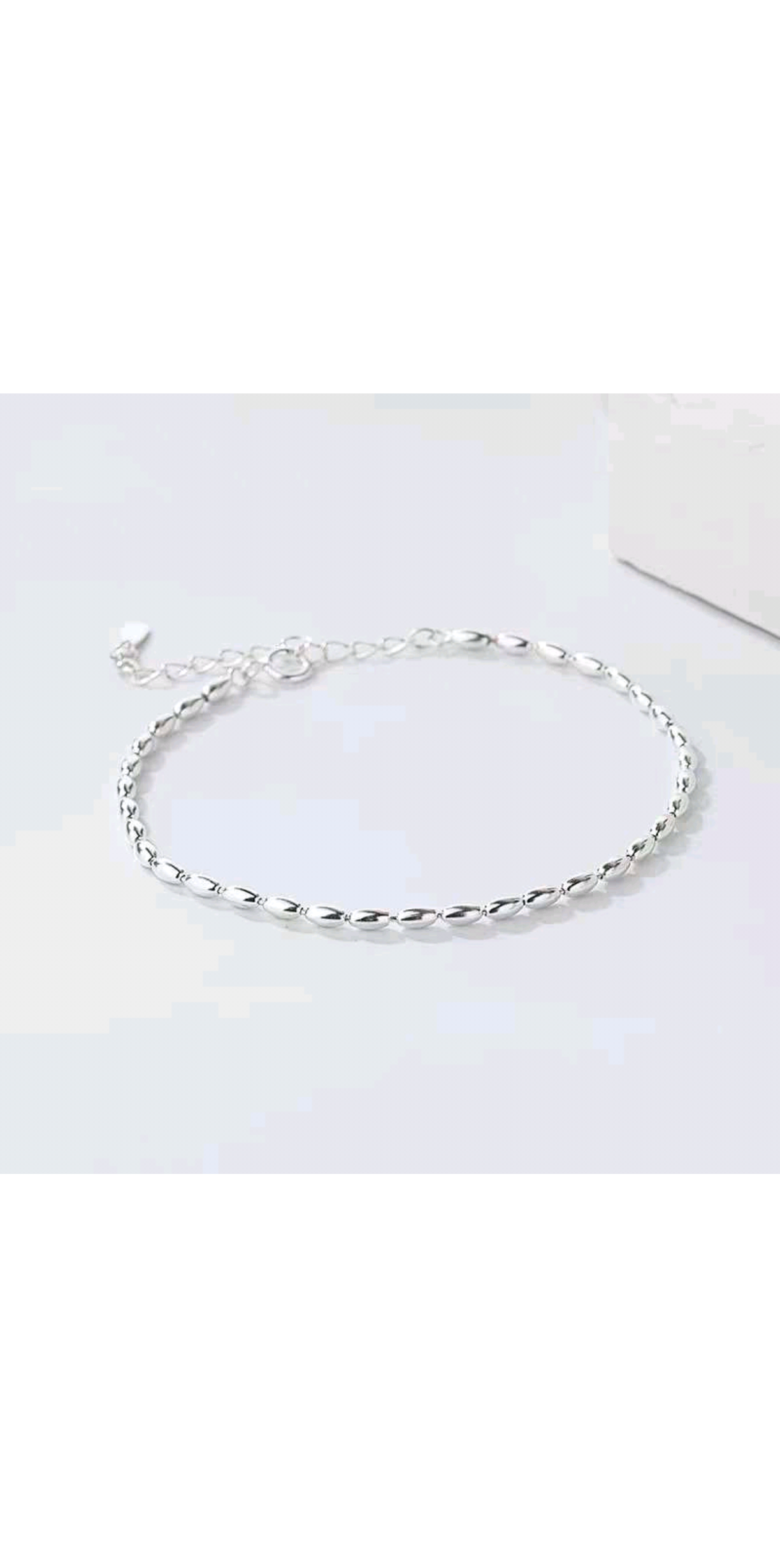The S925 sterling silver millet and bean bracelet for women features a light luxury and niche design that is fashionable and simple