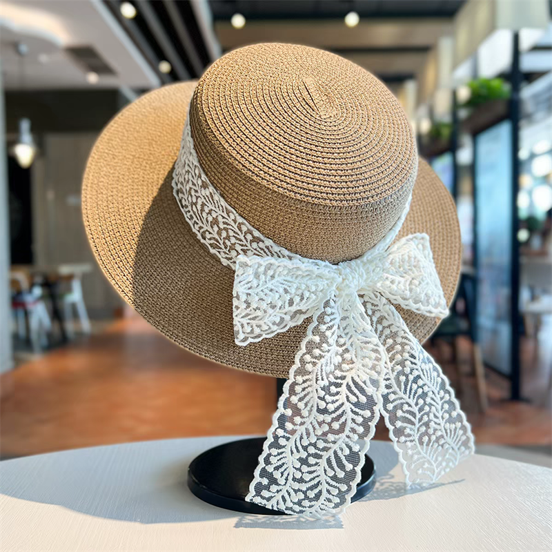 Cross-border new bestsellers: Women's spring and summer flat brim straw hats, lace bow ribbon straw woven hats, flat top hats, sun hats, fashionable seaside vacation, outdoor travel, sun protection hats, daily urban style