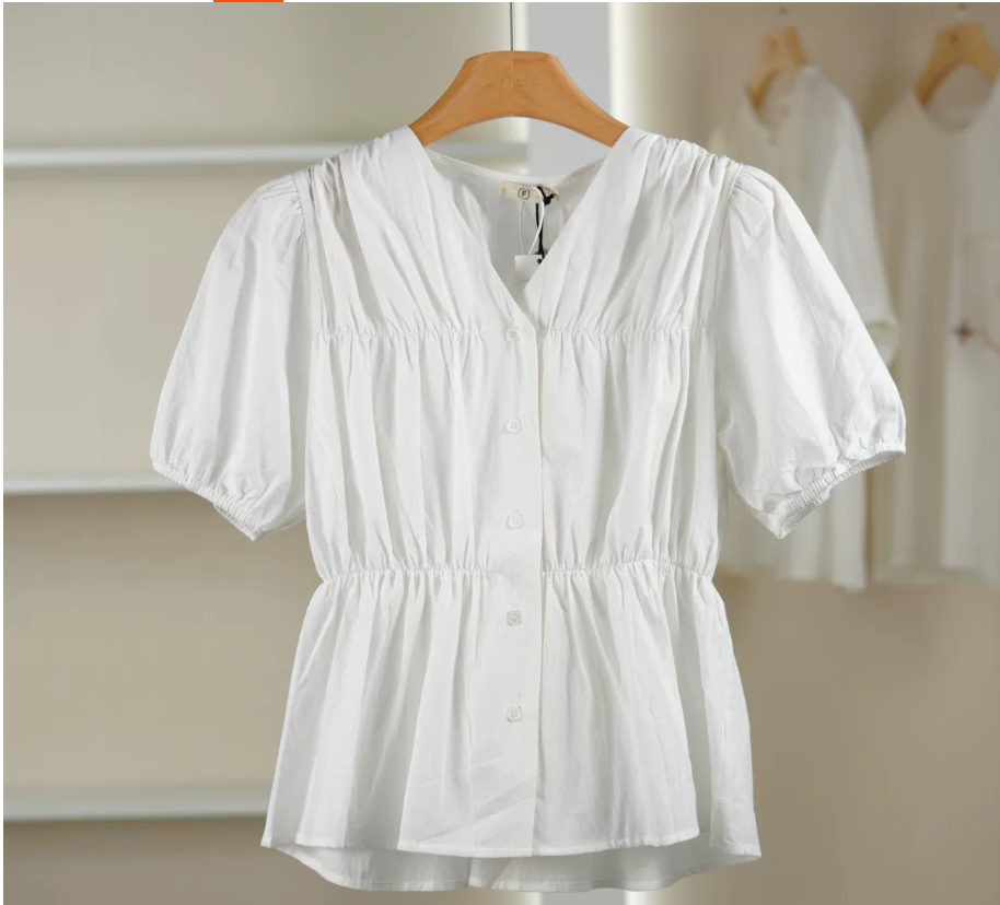 A comfortable and versatile white short-sleeved casual shirt for women
