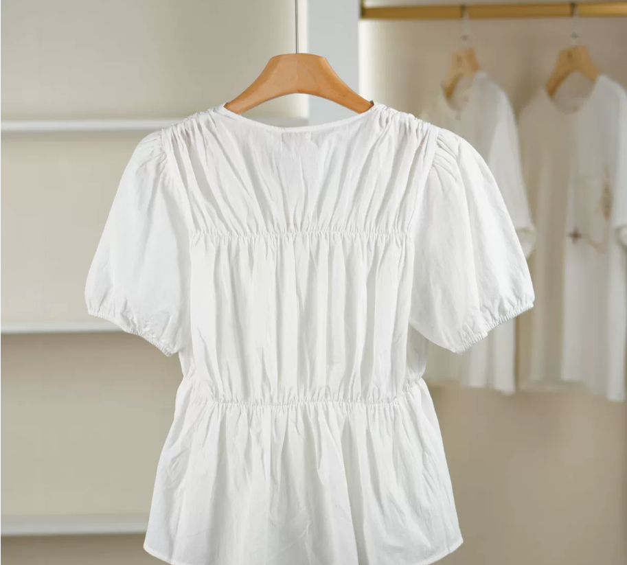 A comfortable and versatile white short-sleeved casual shirt for women Specification image