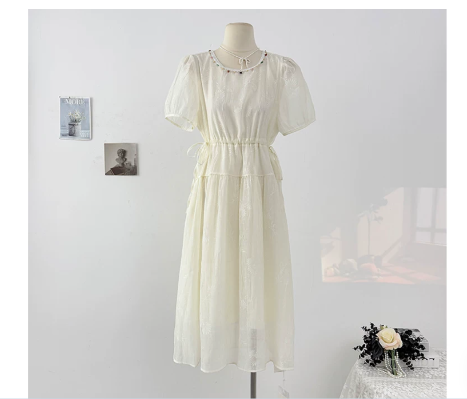 French lace-trimmed round-neck puffed-sleeve dress for women in summer, with a cinched waist, drawstring tie and pleated loose skirt details Picture