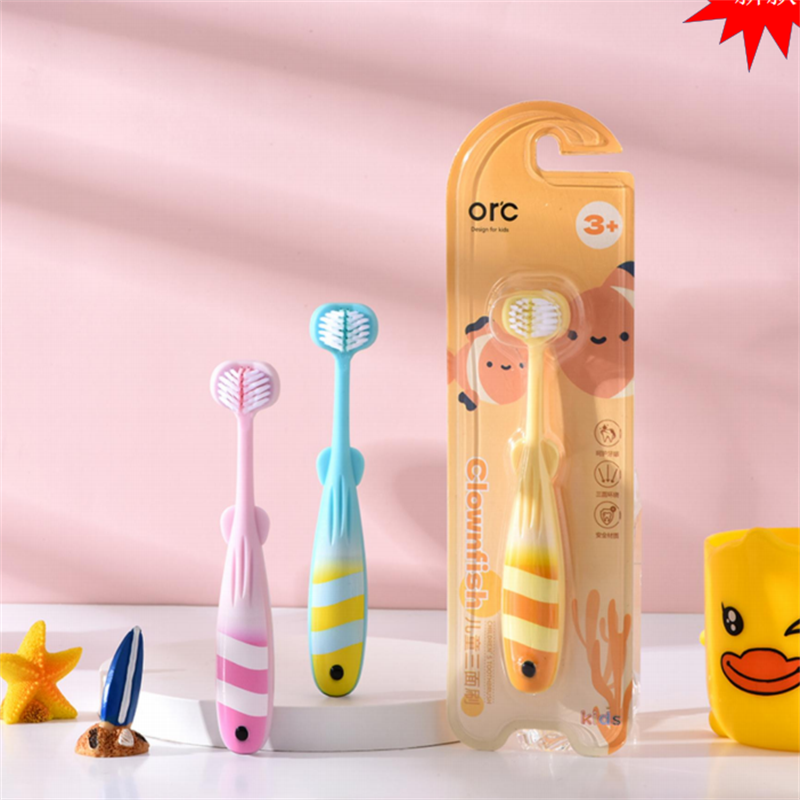 Clownfish children's three-sided toothbrush