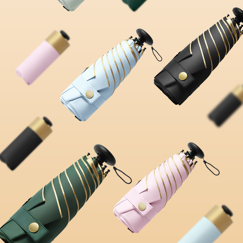 Hengdun ultra-light Mini 6-fold umbrella with gold rubber coating for sun protection and UV protection, featuring a golden edge design, is compact and portable for commuting. It is a dual-purpose folding pocket umbrella that supports wholesale and custom logos