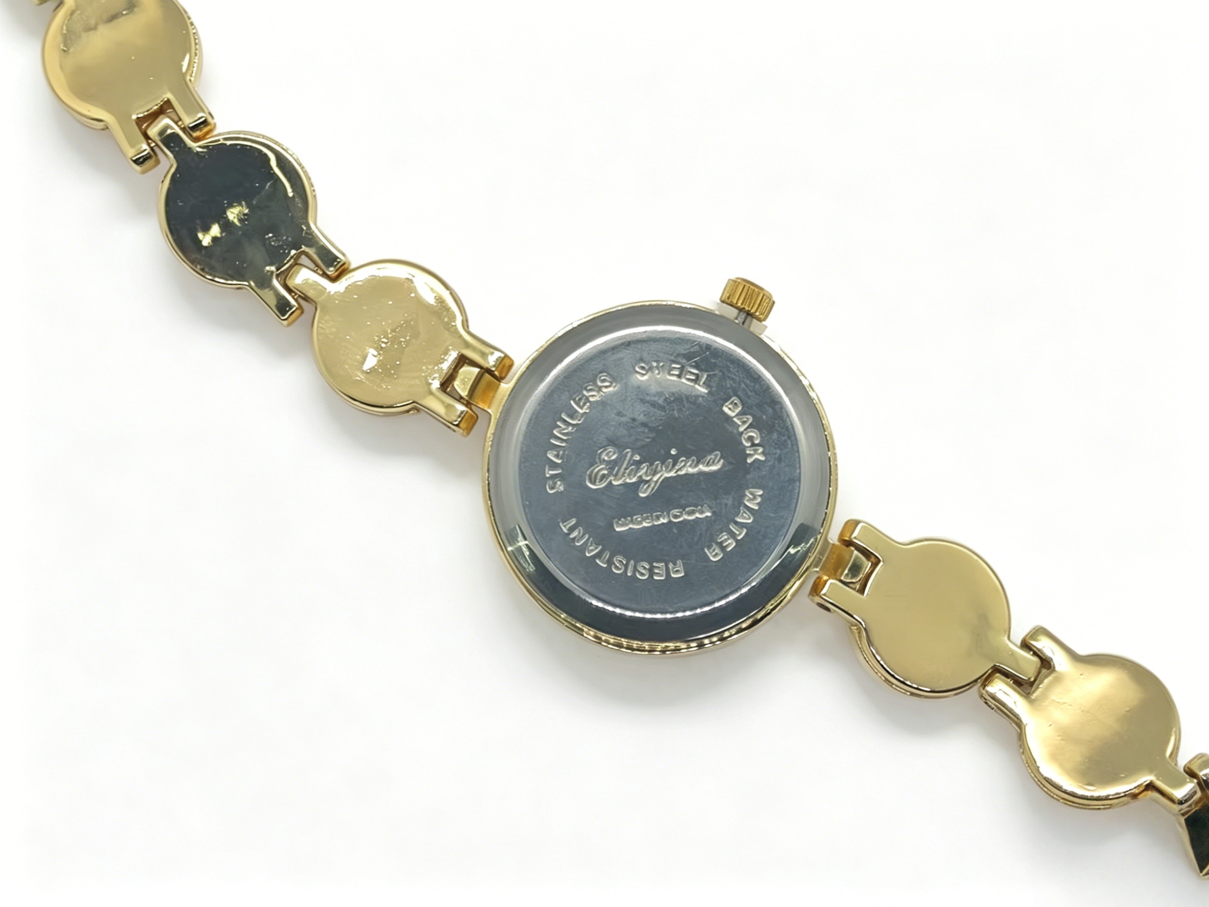 The watch manufacturer's diamond-encrusted, gold, silver, red and blue dual-color quartz watch is a fashionable, trendy and classic design for couple clothing accessories Specification drawing
