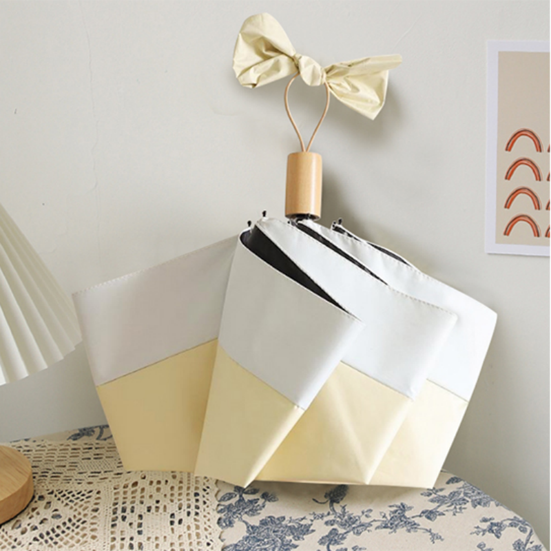 Hengdun simple two-color spliced black rubber sun umbrella, lightweight and portable, wooden handle three-fold umbrella, reinforced, wind, rain and sun protection, UV protection, sun protection and shade umbrella for women, supports wholesale customization, logo advertising umbrella Item Picture