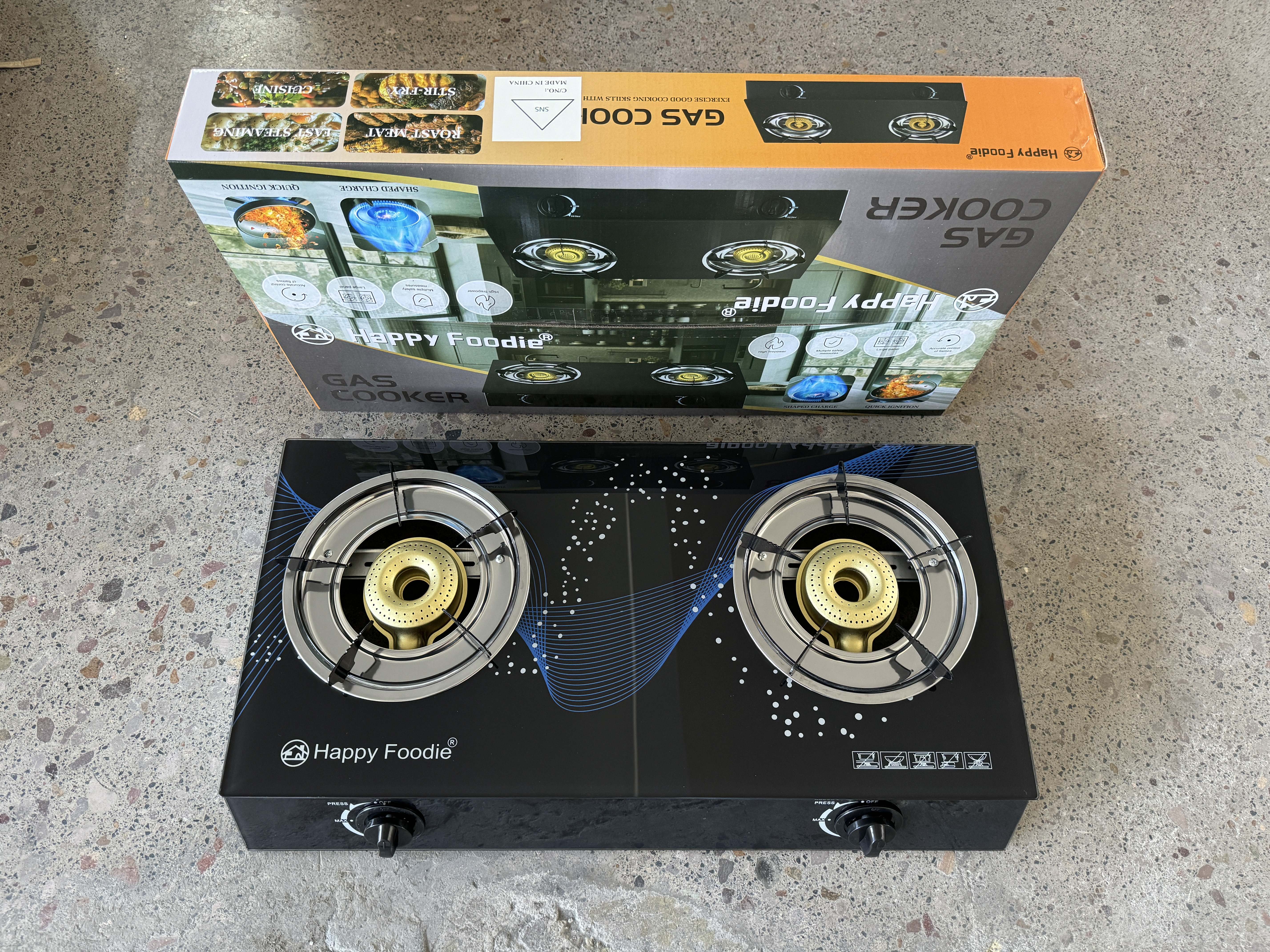 (especialmente para la exportación y no para la venta nacional) Happy Foodie HF-62E vidrio de chapa de hierro de doble cocina cocina de gas de doble cocina doméstica de escritorio fábrica de fuente de gas