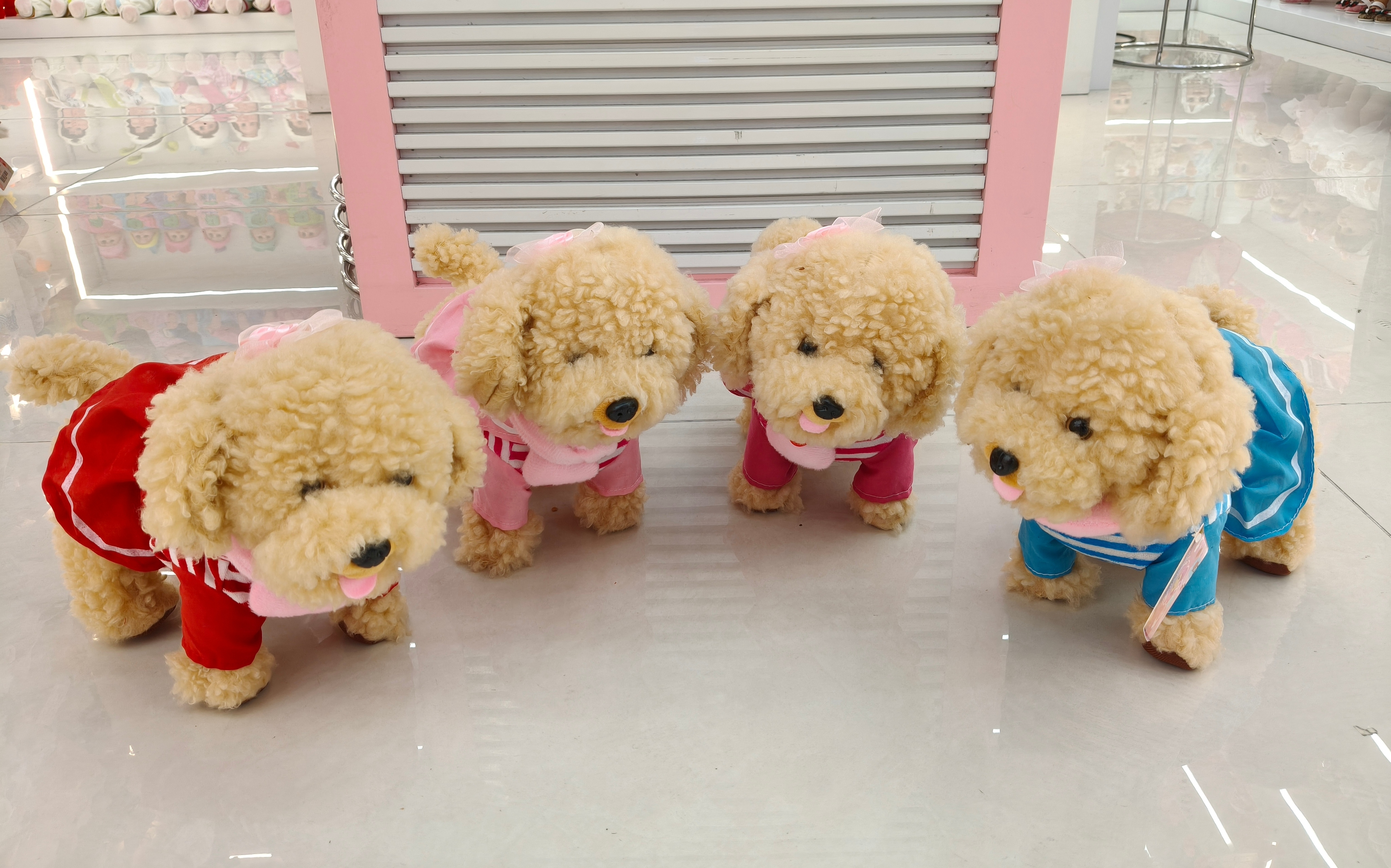 A simulated little dog children's toy with 60 songs and a leash that can walk and lick its tongue