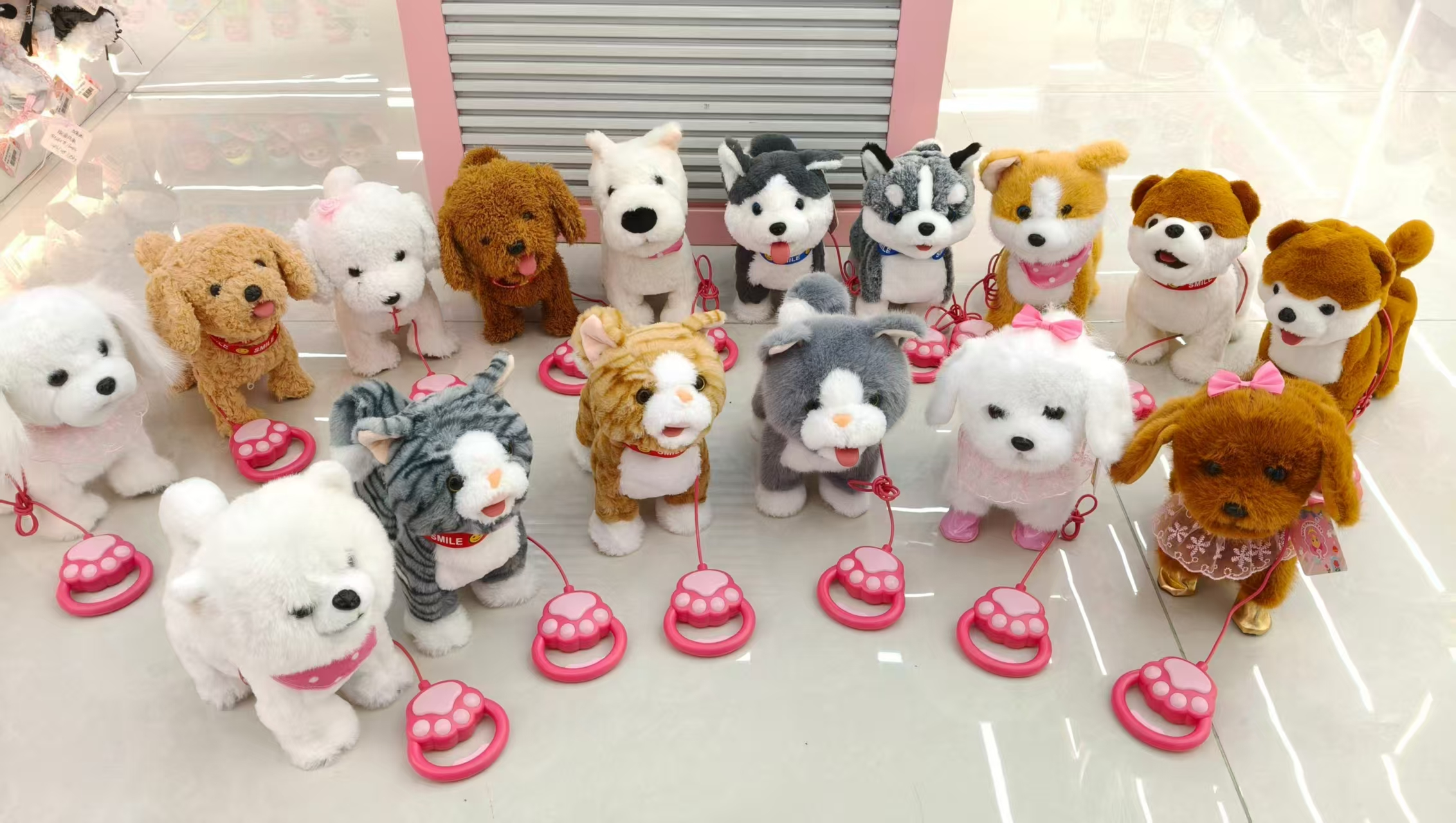 Cute plush toys of licking cats and dogs with tongues and tails, cute little dog dolls, and children's toys for learning to talk