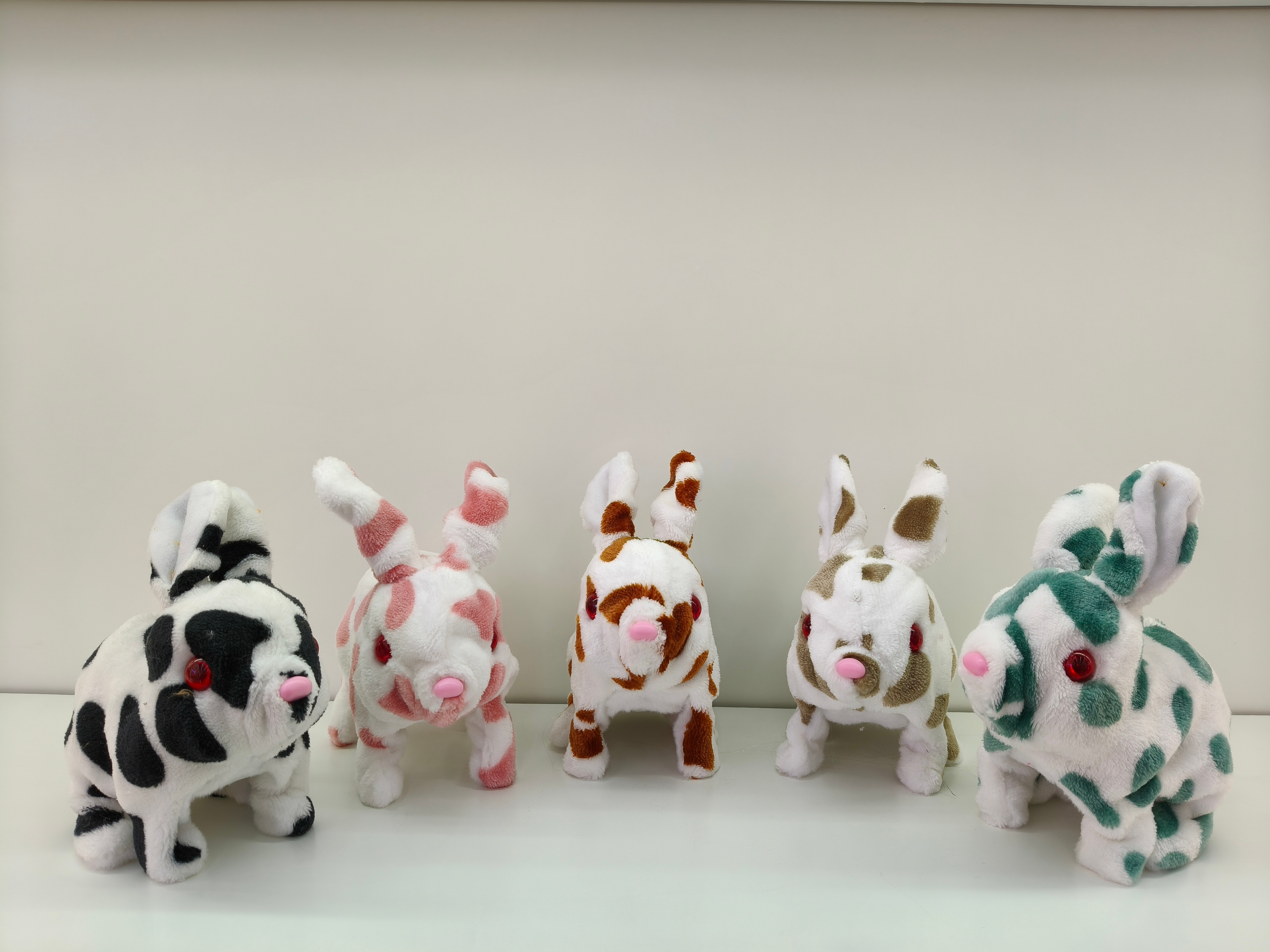 Spotted rabbits can walk and make sounds. Electric and cute toys for children