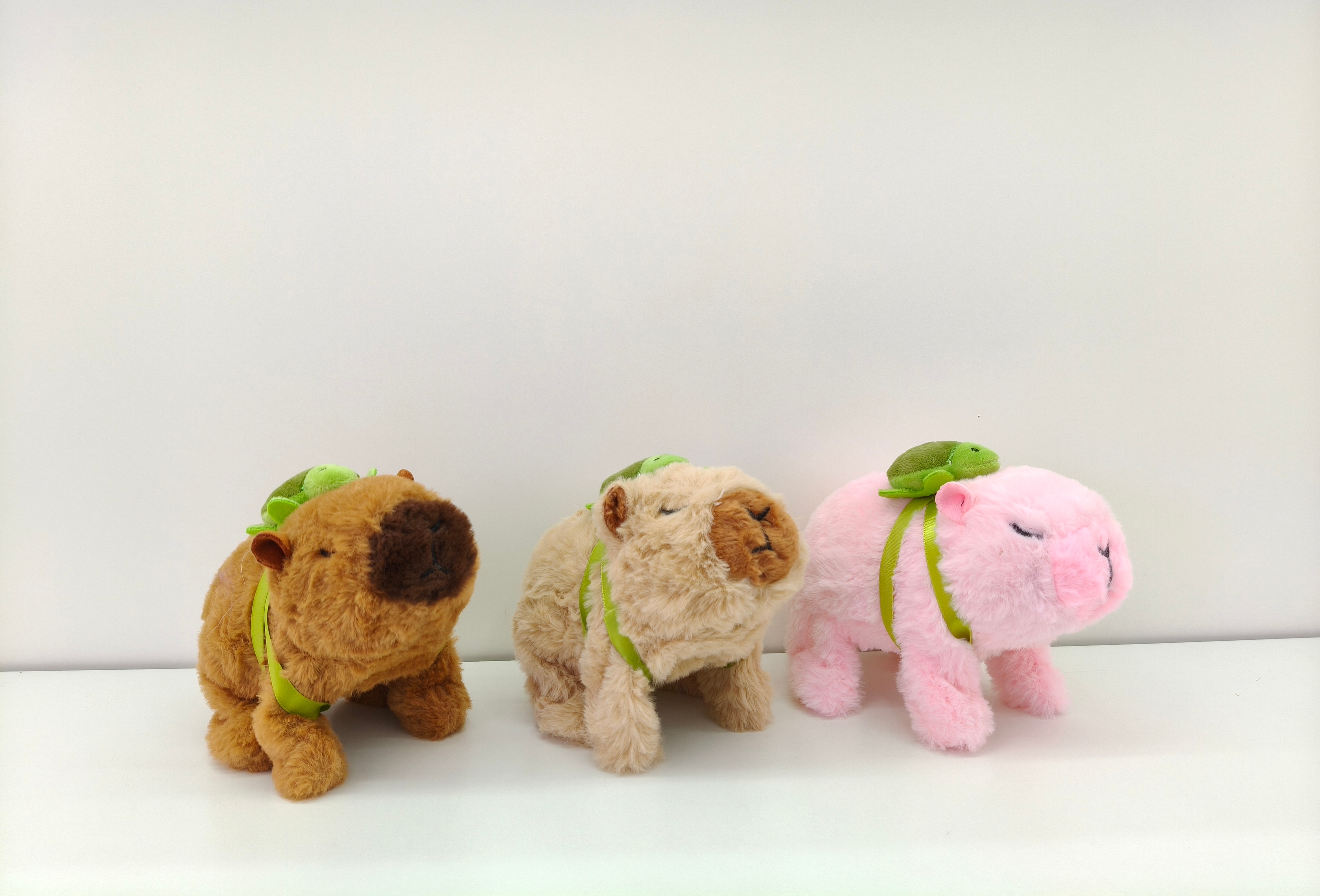 Three plush backpacks of Kapiba, cute electric puppy toys that can walk and bark